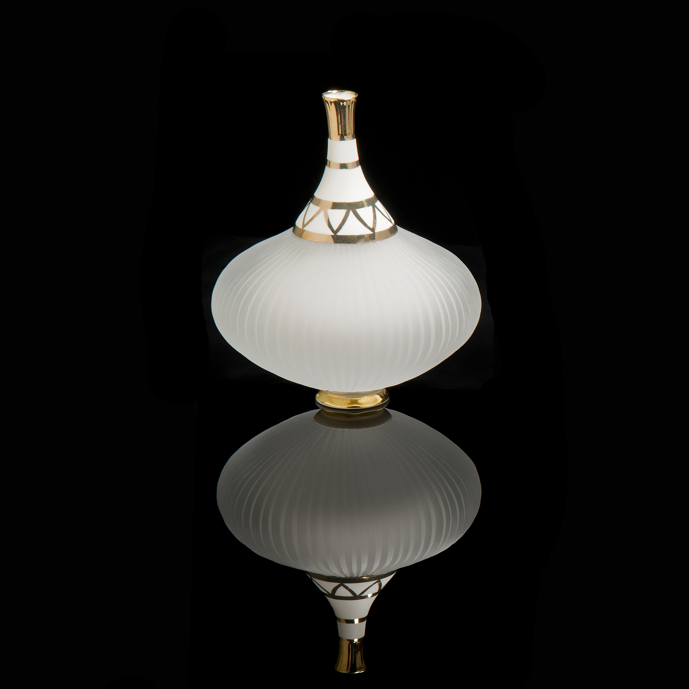 glass vessel inspired by english teapot with porcelain and gold lustre