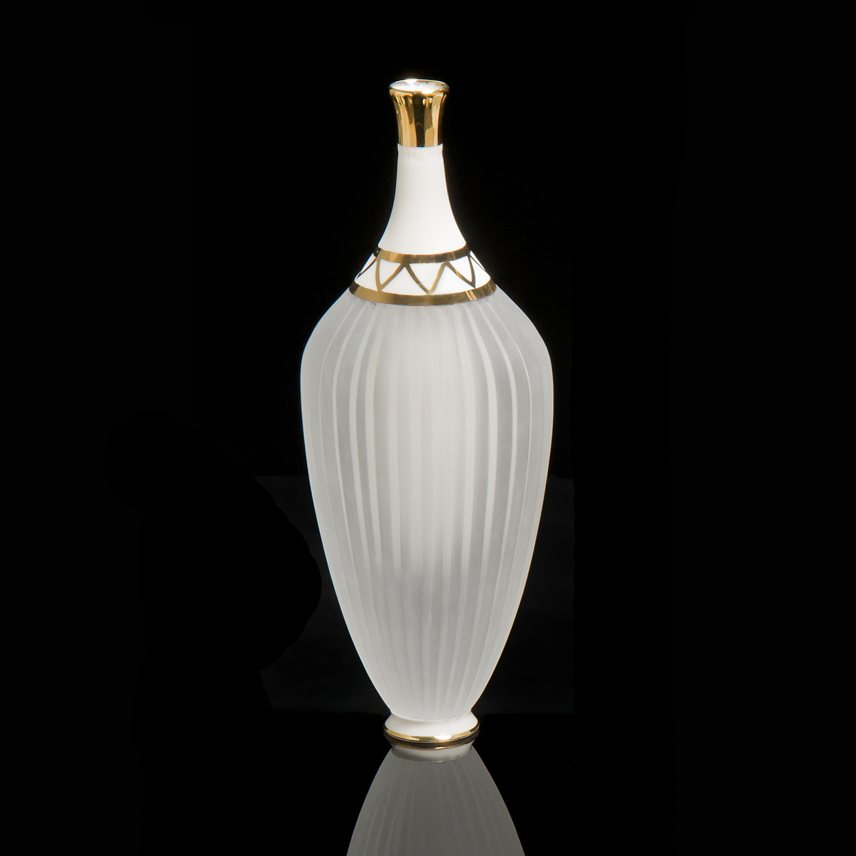 tall crystal glass and white porcelain art sculpture with gold top and trim