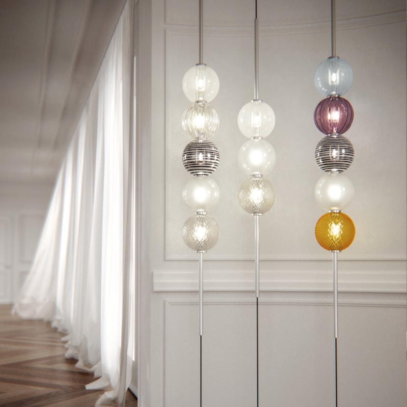 three floor lamps with colourful spherical glass bubbles