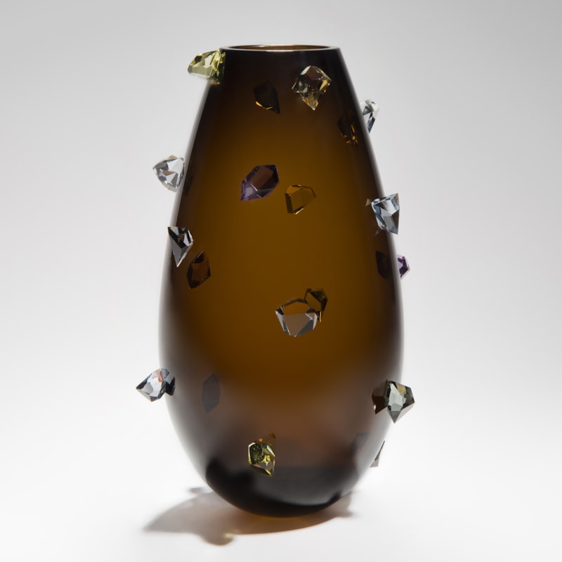 Handblown modern art-glass vase in dark red decorated with sparse white crystals on the outside