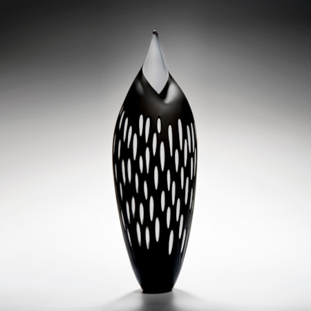 bird like glass artwork in black with white trim