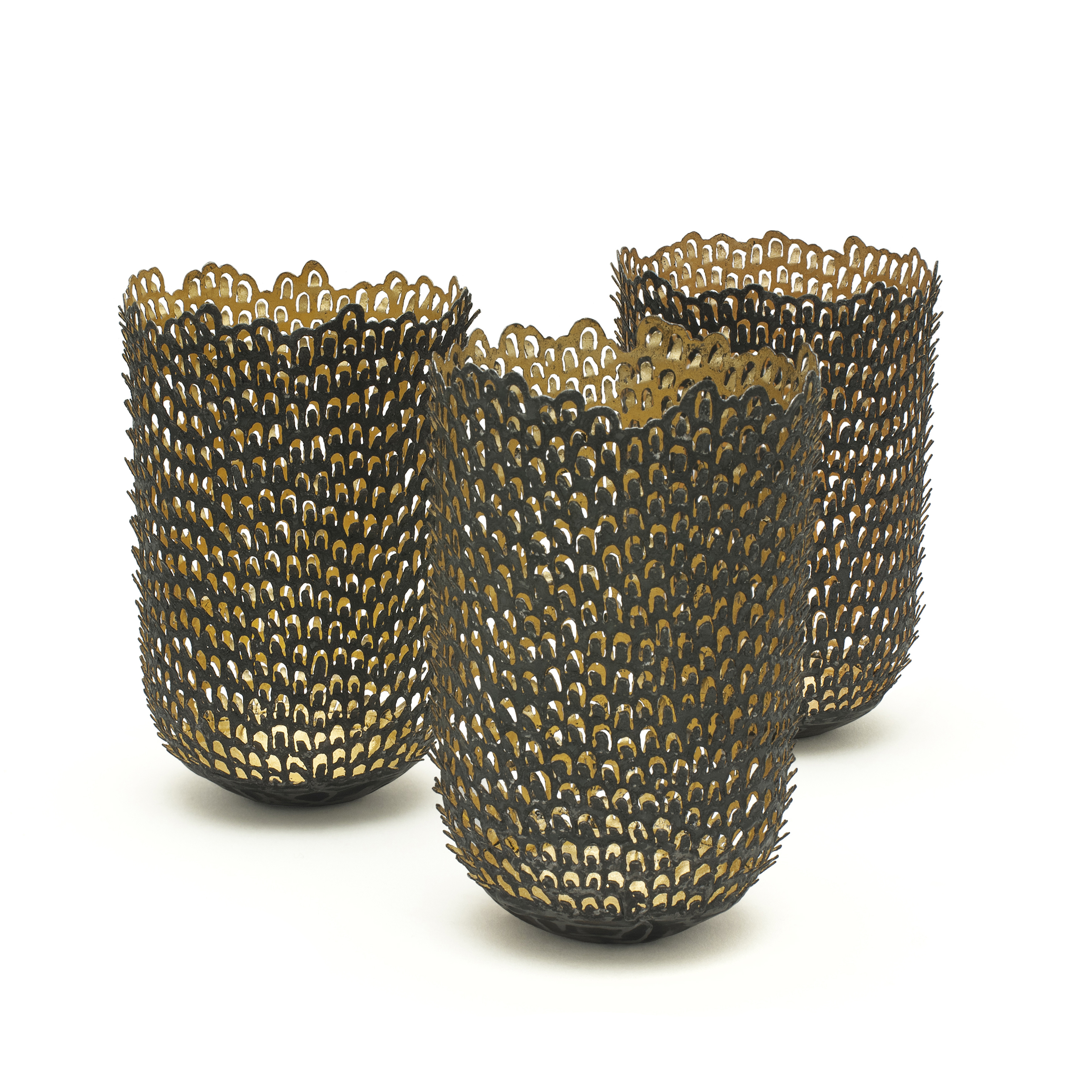 three steel and gold vase sculptures made from small pieces of stacked steel and gold 