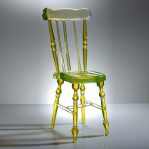 neon green coloured art glass sculpture of a chair