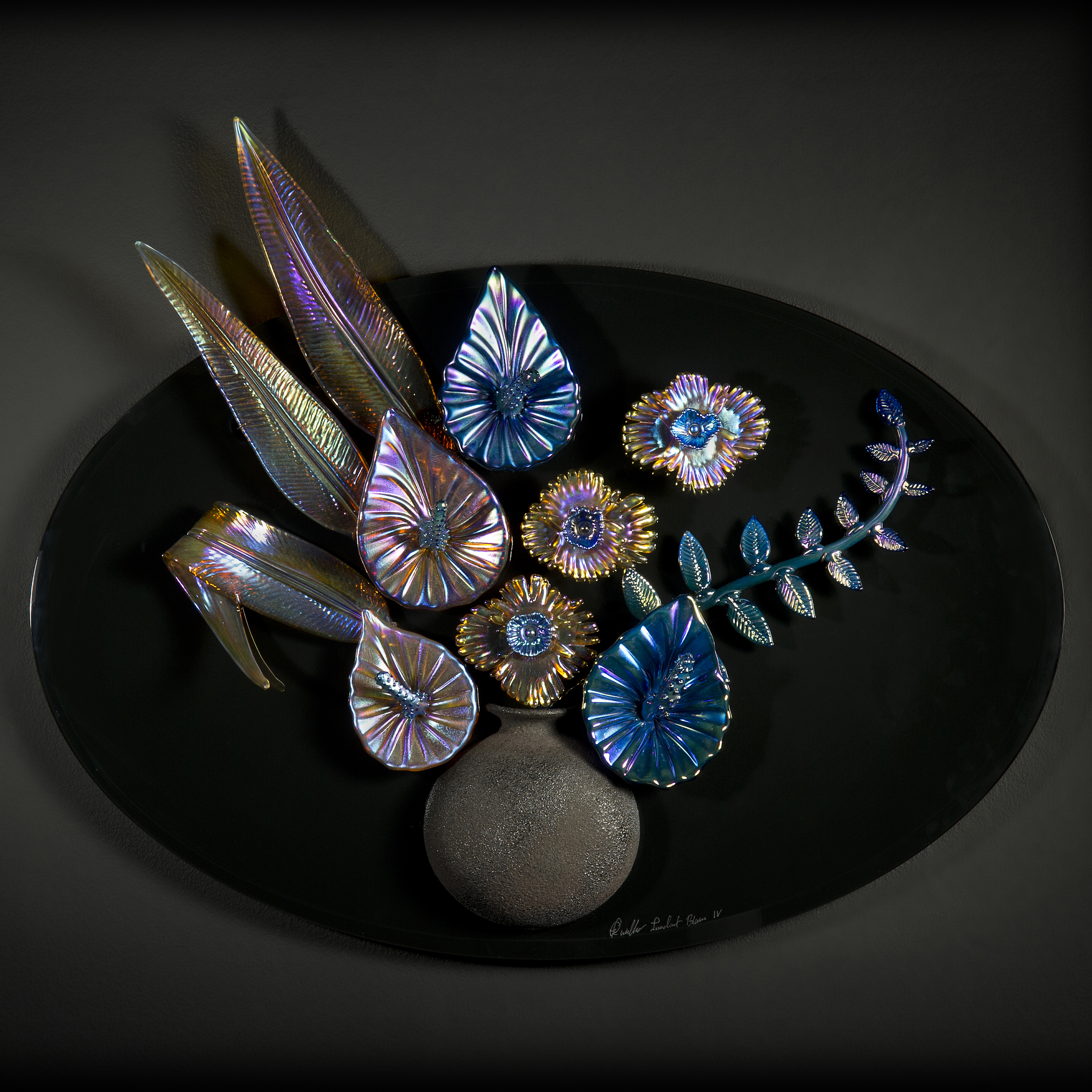 oil coloured art glass sculpture of flowers and vase