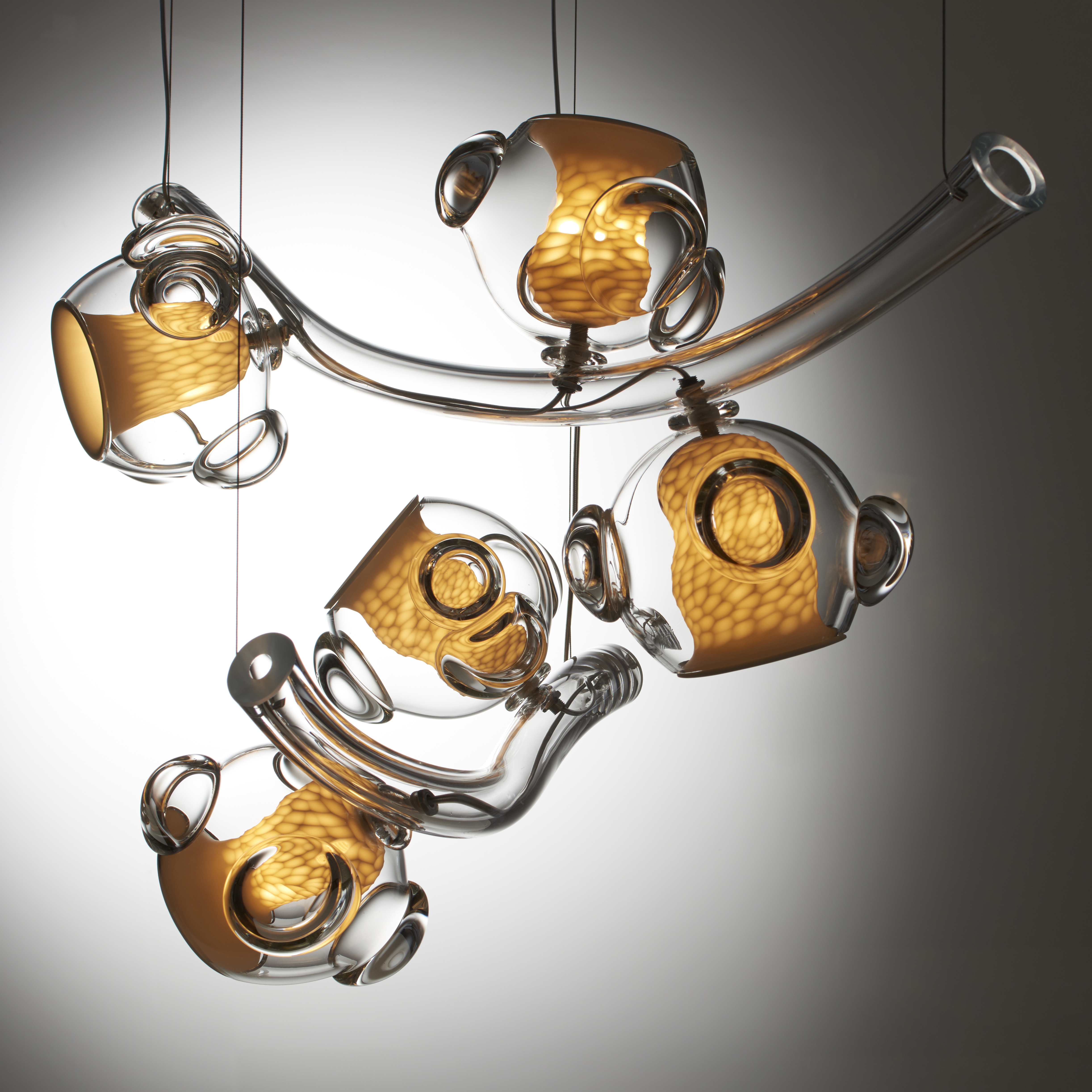 handblown glass and porcelain contemporary art ligh sculpture in clear and amber