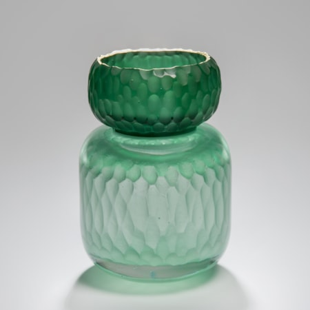 green sculpted glass jar artwork