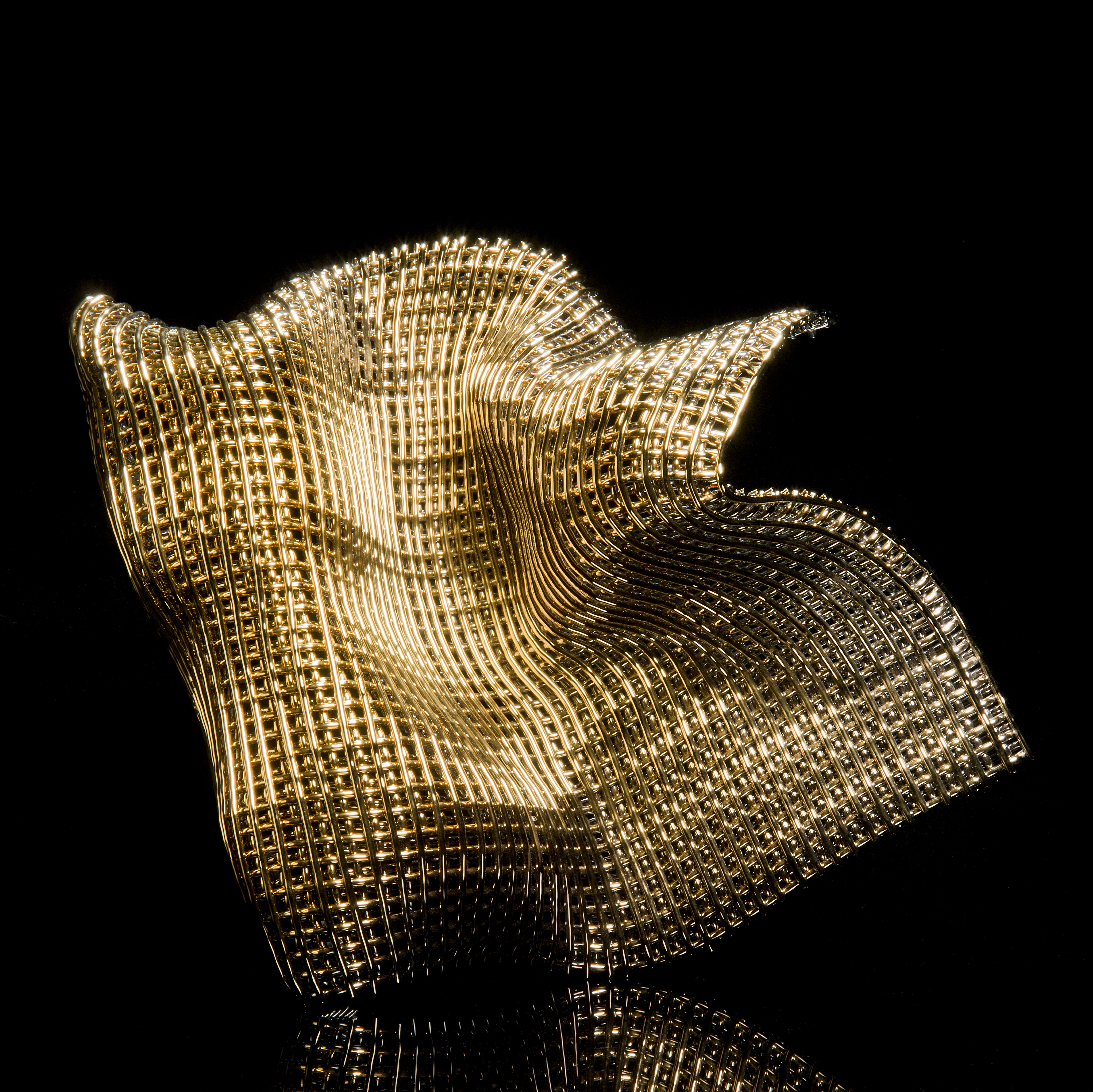 fused contemporary glass art sculpture with kiln and gold