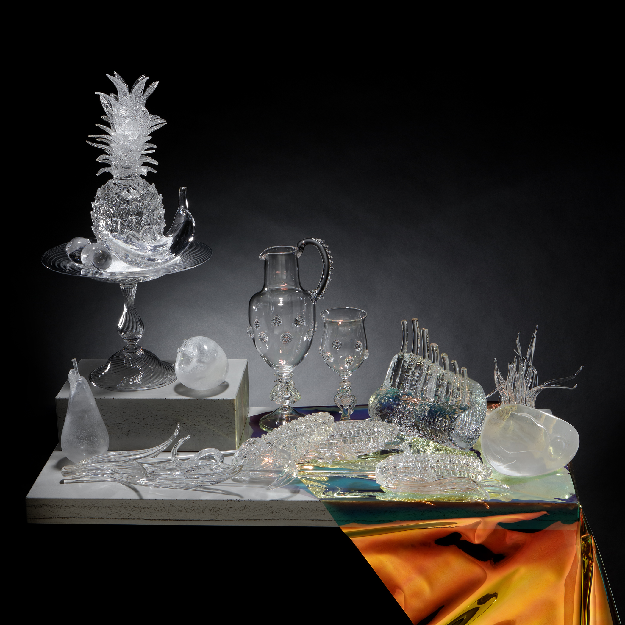 elaborate still life artwork of fruit made of glass PVC and concrete