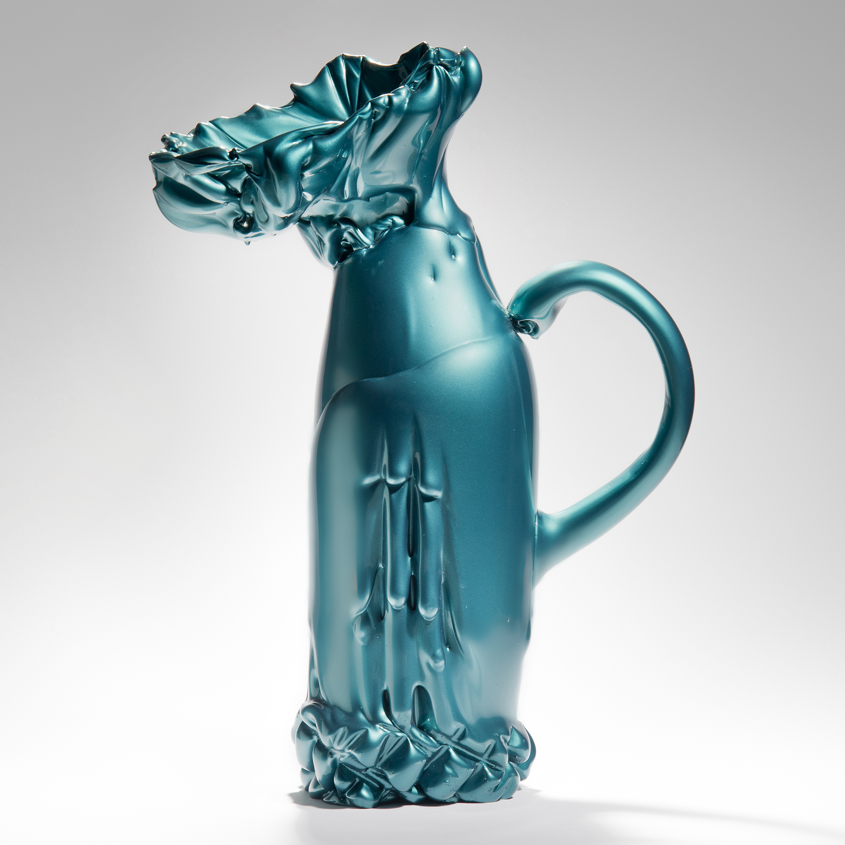 experimental scandinavian glass art sculpture of pitcher with handle in green