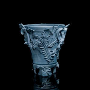 blue contemporary ceramic vase sculpture in classical style with classical flower trim