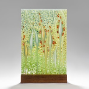 fused glass ornamental panel inspired by nature with walnut base