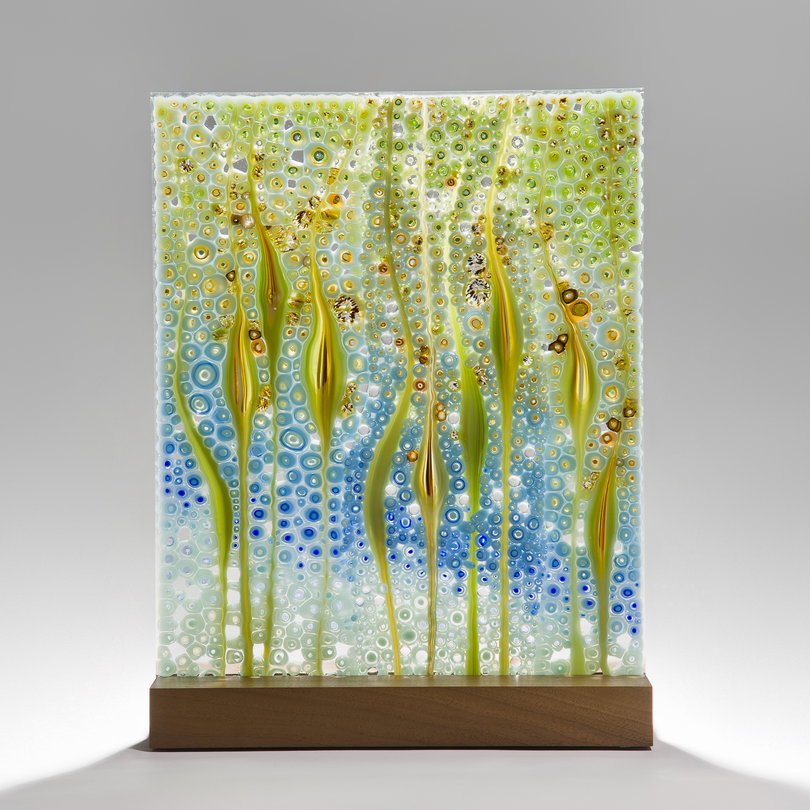 fused tropical coloured glass sheet sculpture with walnut base