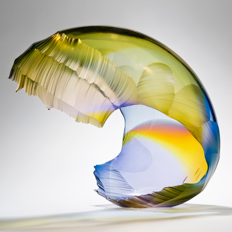 art glass wave sculpture in yellow and blue shades