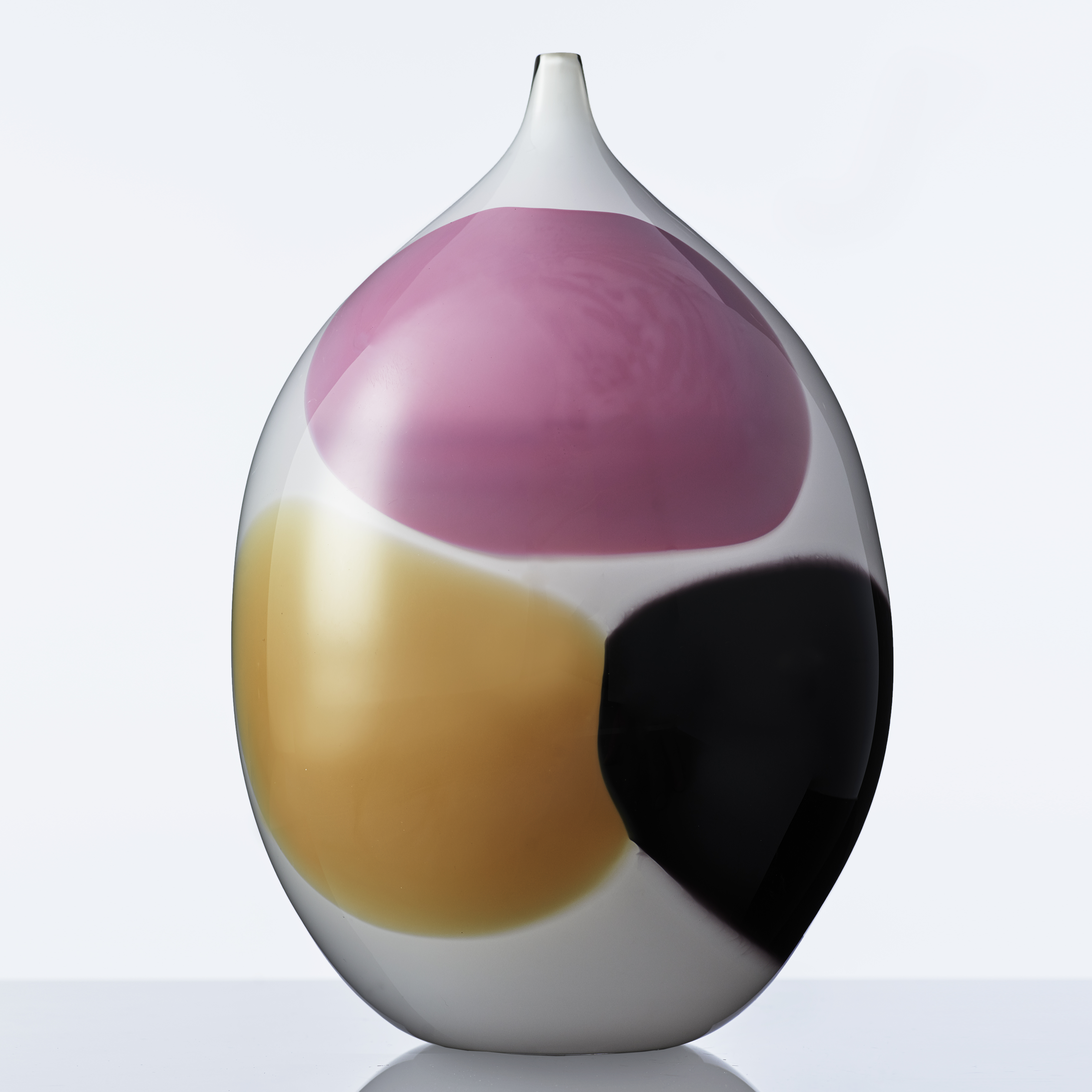 white glass vase sculpture with large pink orange and black dots