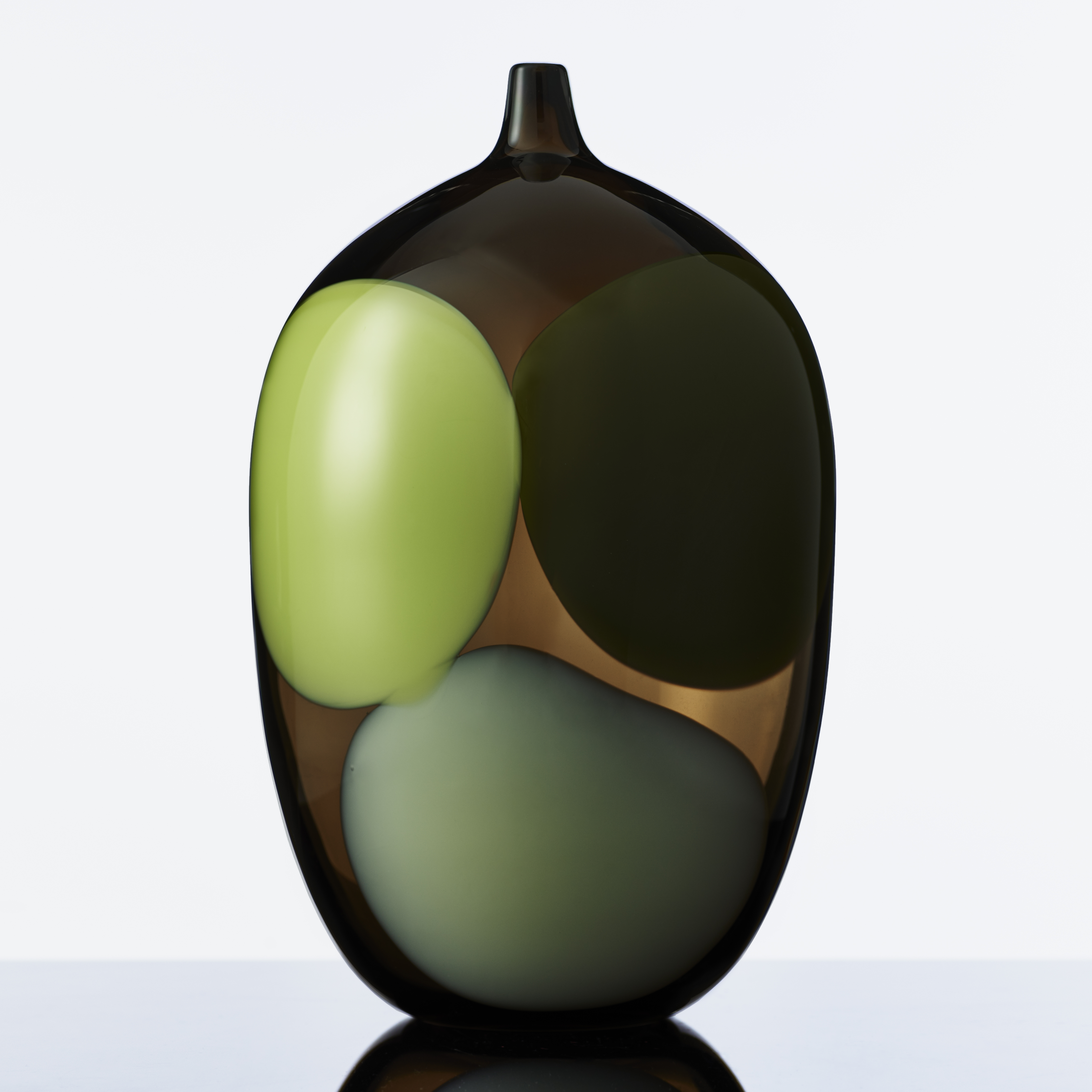 modern art glass vase in dark brown with light green grey and black blobs