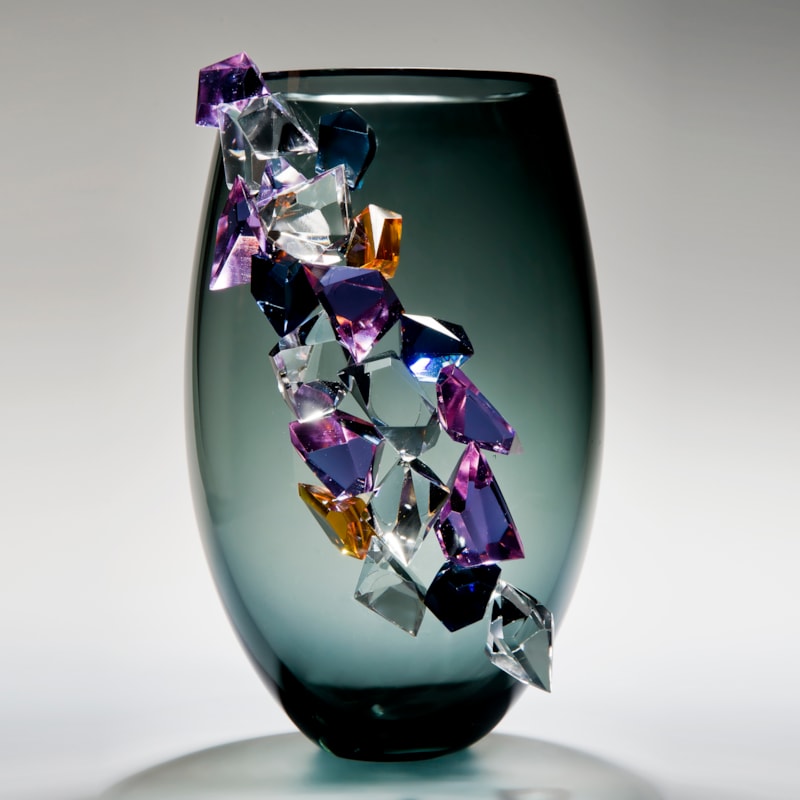 modern grey glass vase sculpture with large coloured crystal exterior