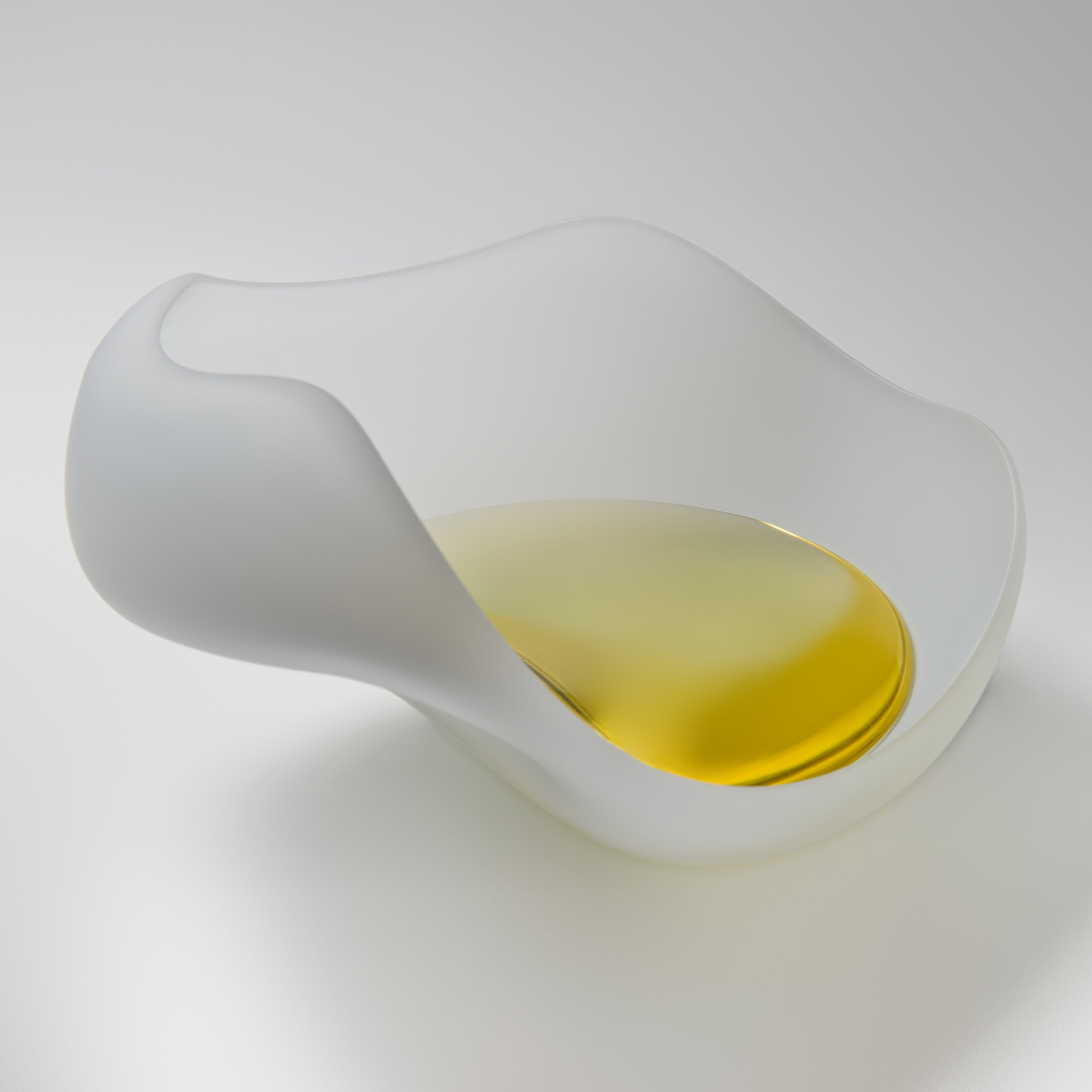 Blown and cast glass ornament with cracked eggshell feel