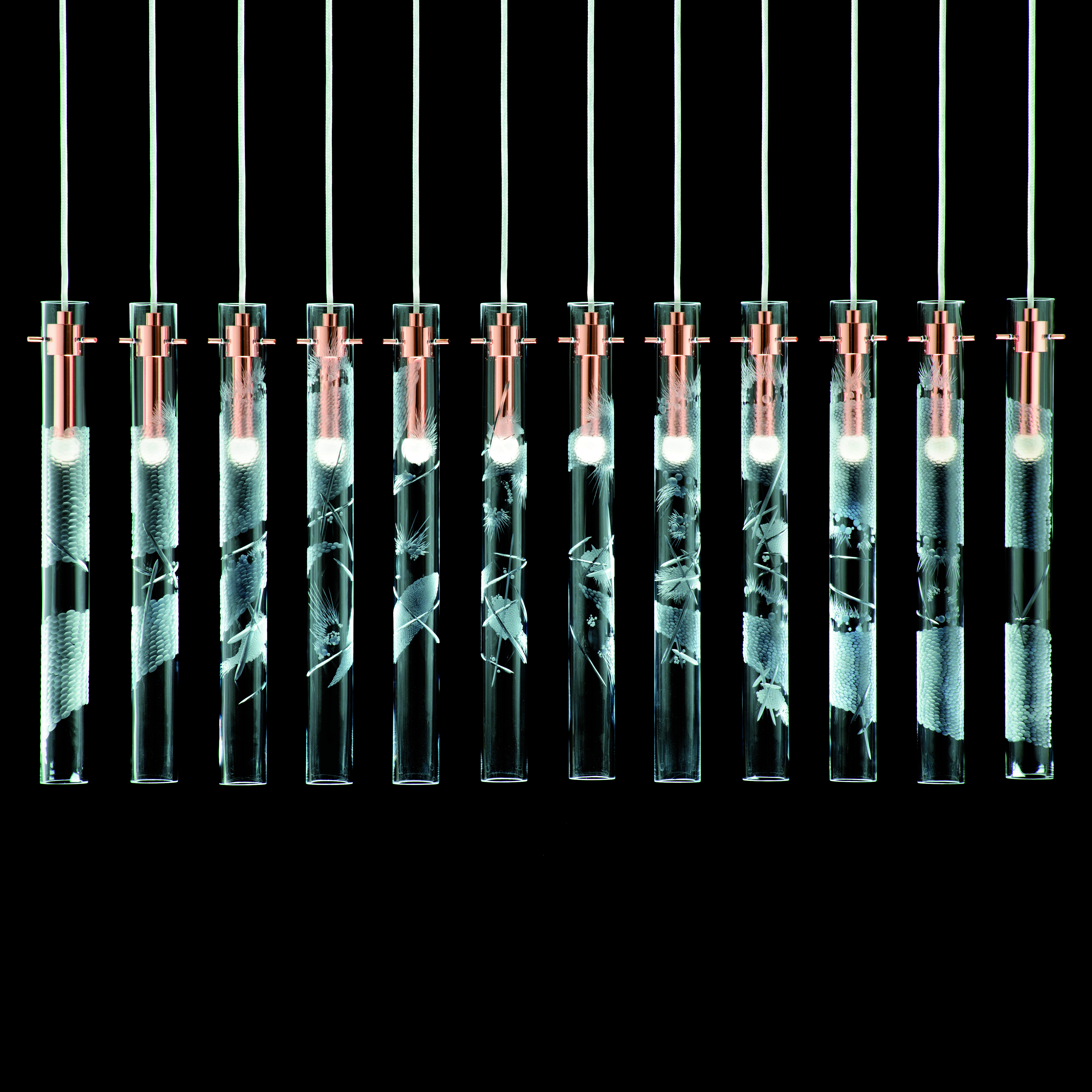 hanging blown glass lighting installation with metal fittings