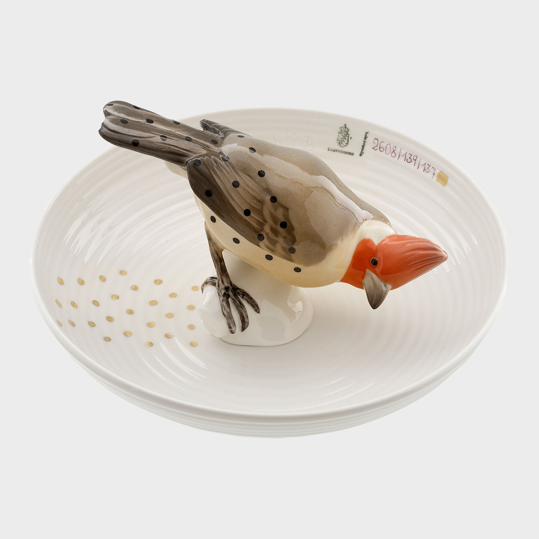 porcelain decorative art bowl with model of bird sat in centre