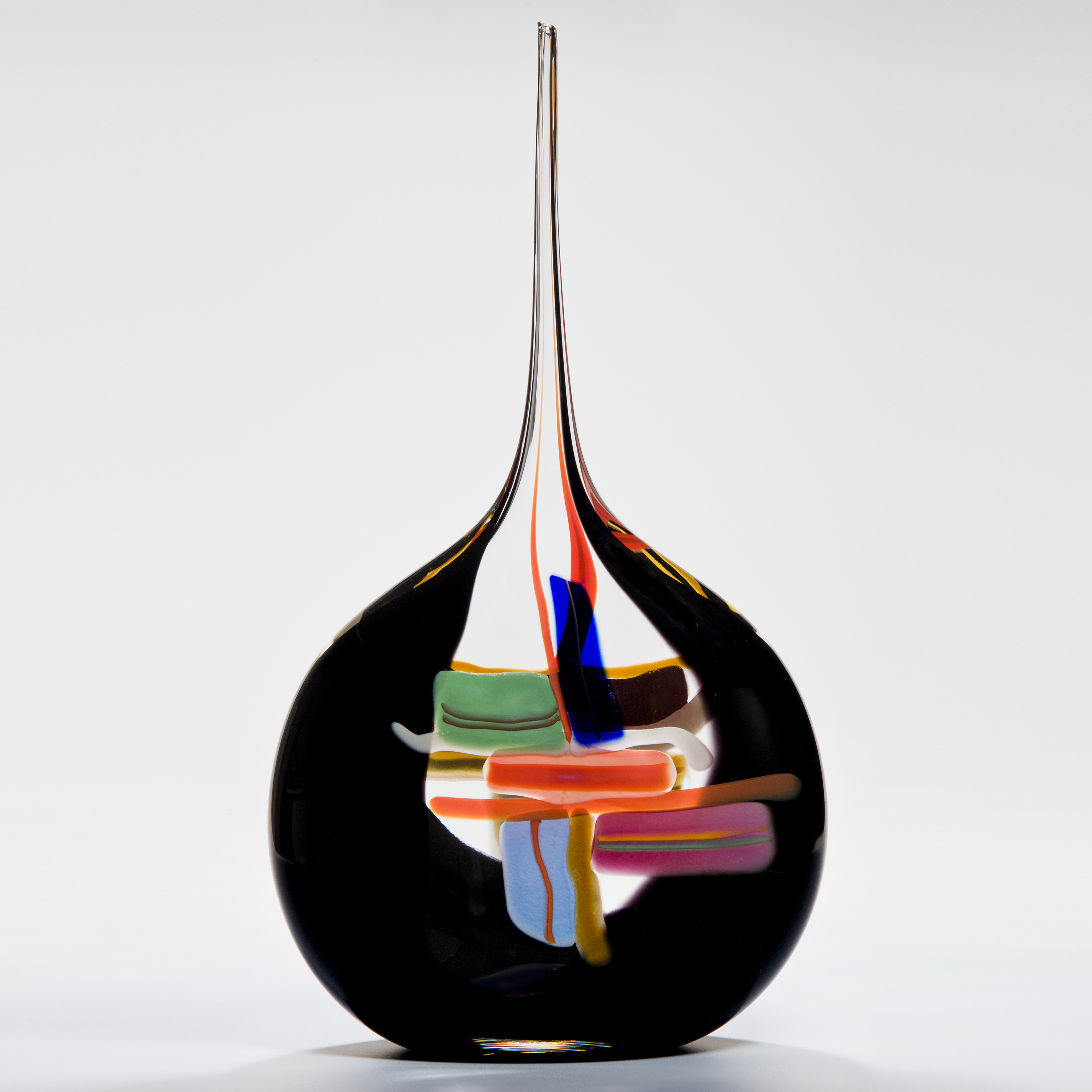 abstract modern art glass vase with round black base colourful pattern and long thin neck