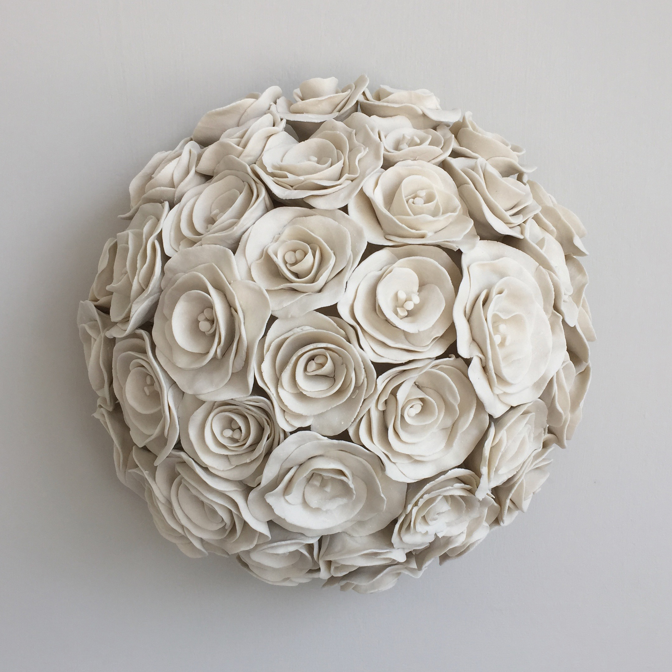 porcelain decorative ceramic sculpture of roses in white