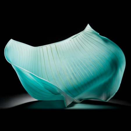 turquoise freehand blown glass sculpture of a petal