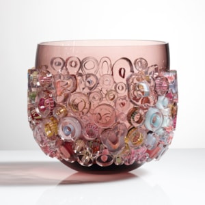 light brown glass vase sculpture with external lightly coloured donut shapes