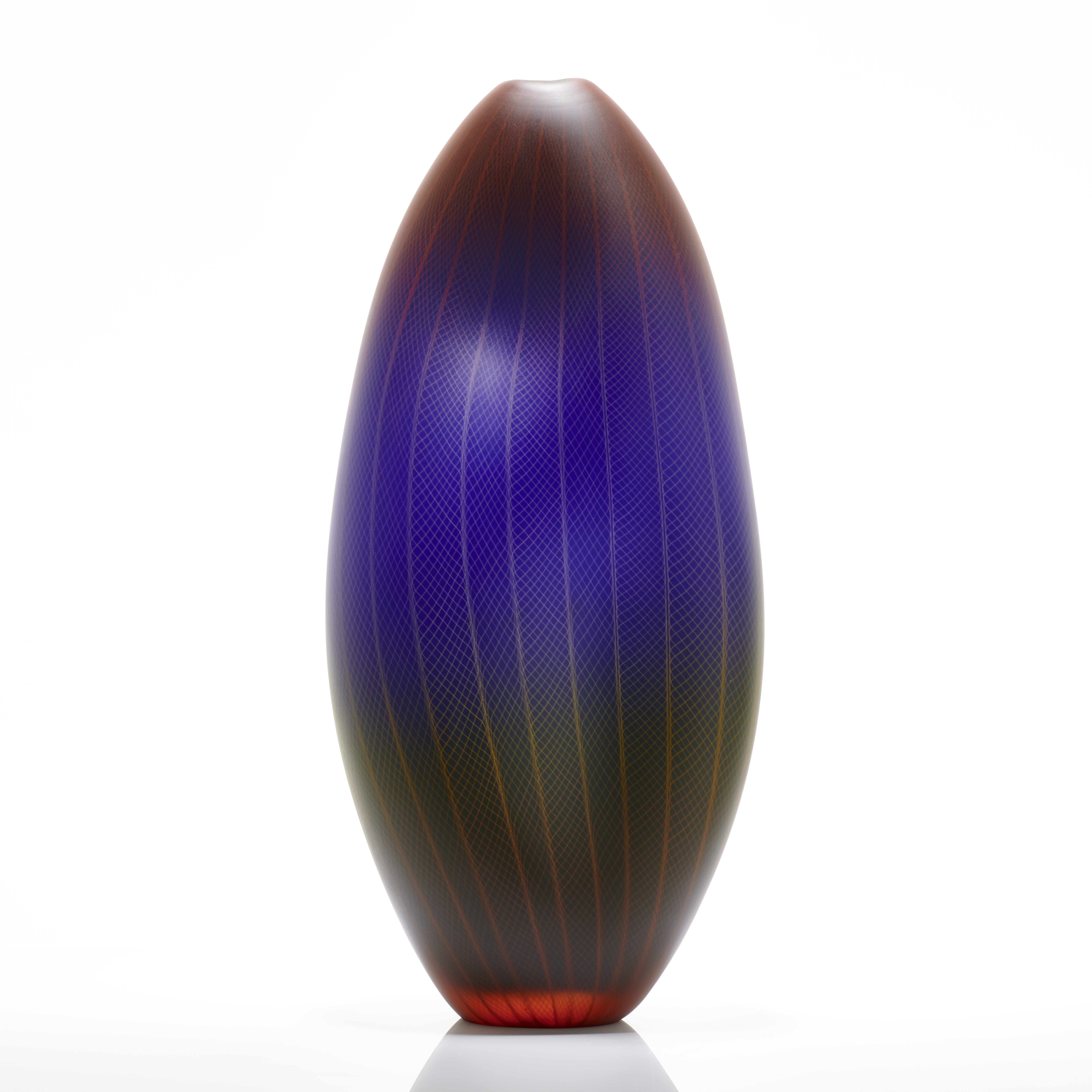 tall oblong blown glass vase in dark purple, red and black with lined and checked external engraving