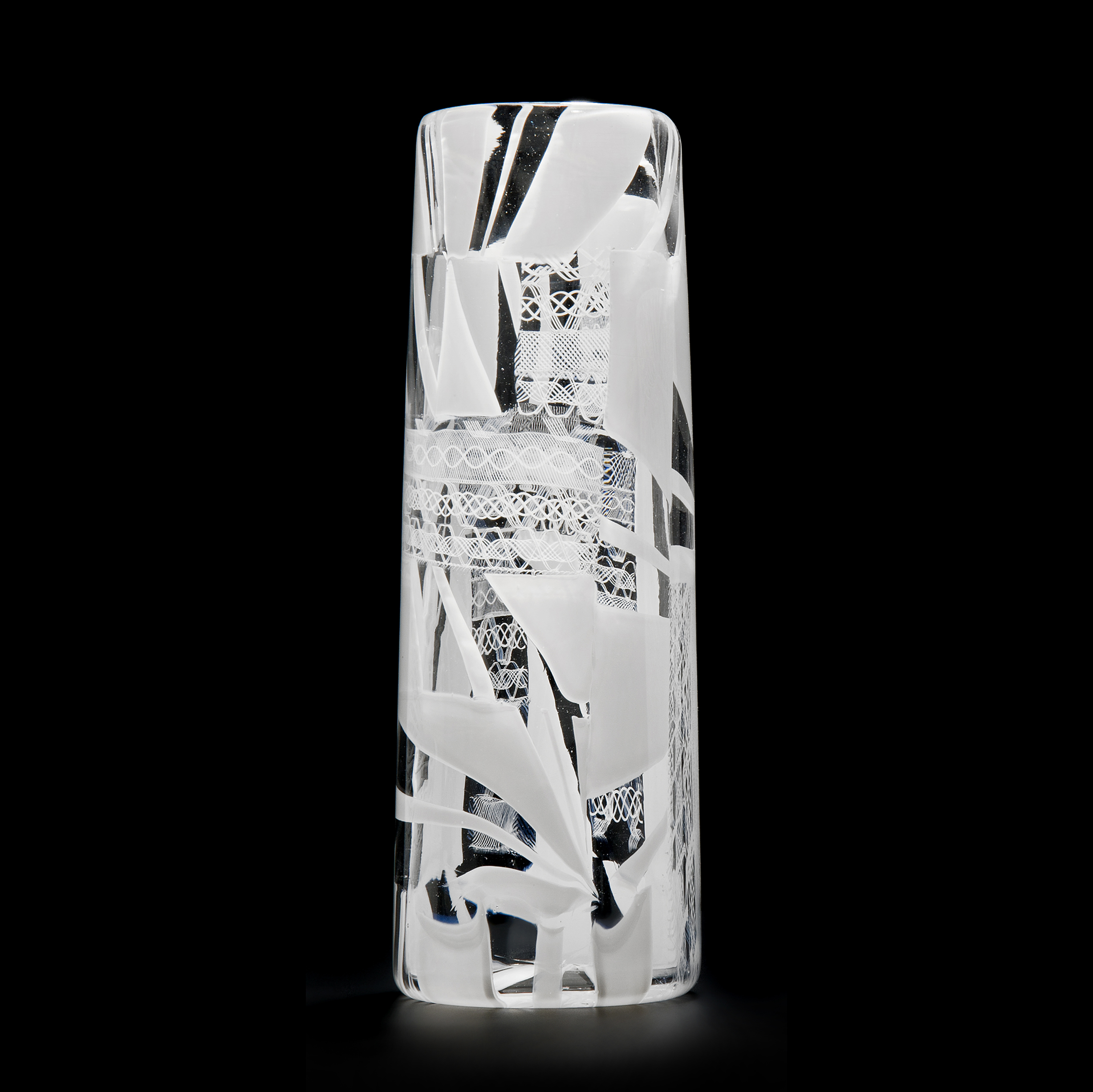 tall clear glass vase sculpture with white pattern