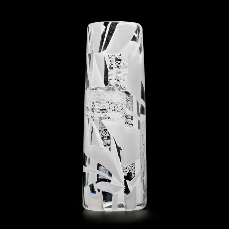 tall clear glass vase sculpture with white pattern