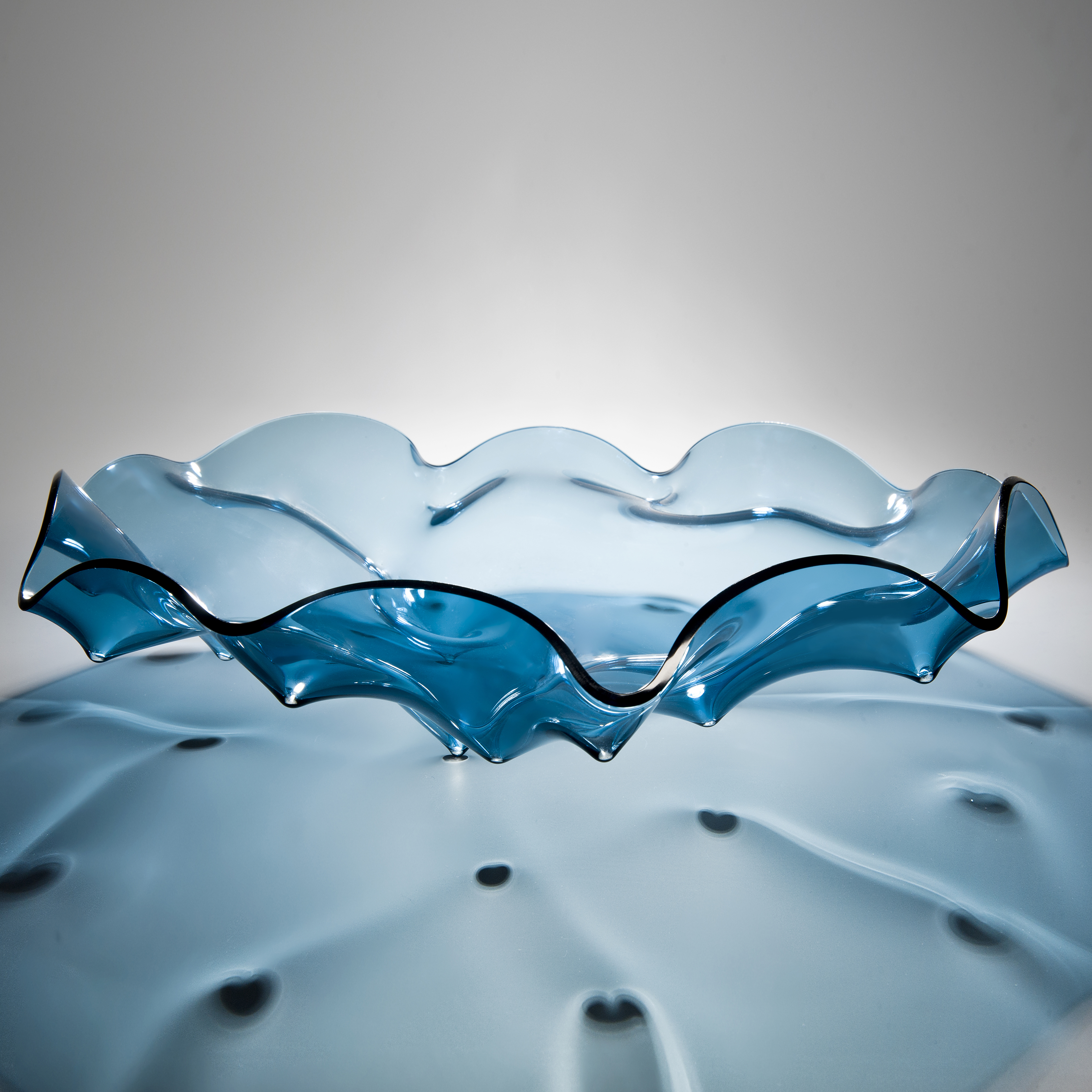 aqua blue art glass bowl sculpture with rippled edge pattern