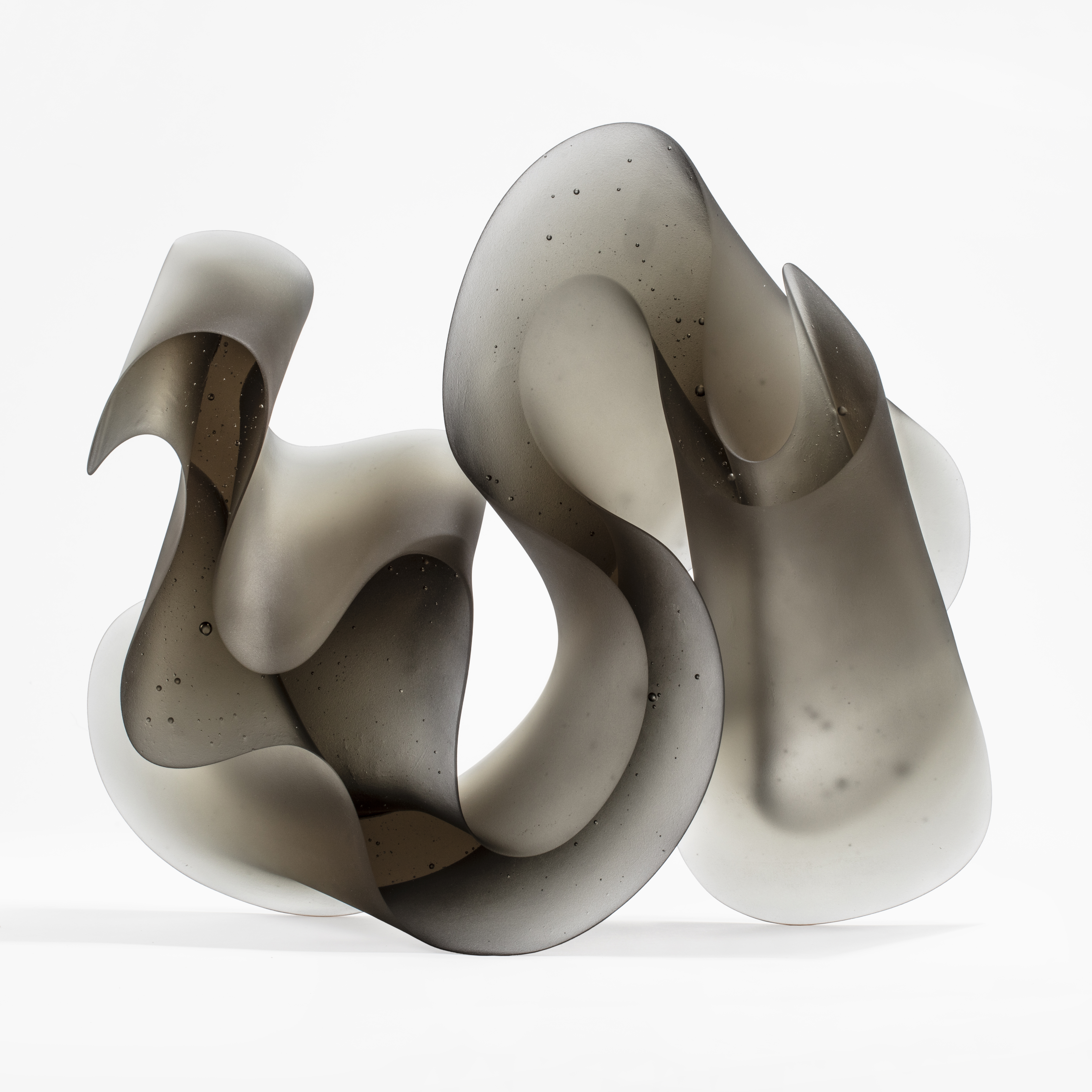 contemporary abstract art-glass scultpture of squiggly line in grey and white