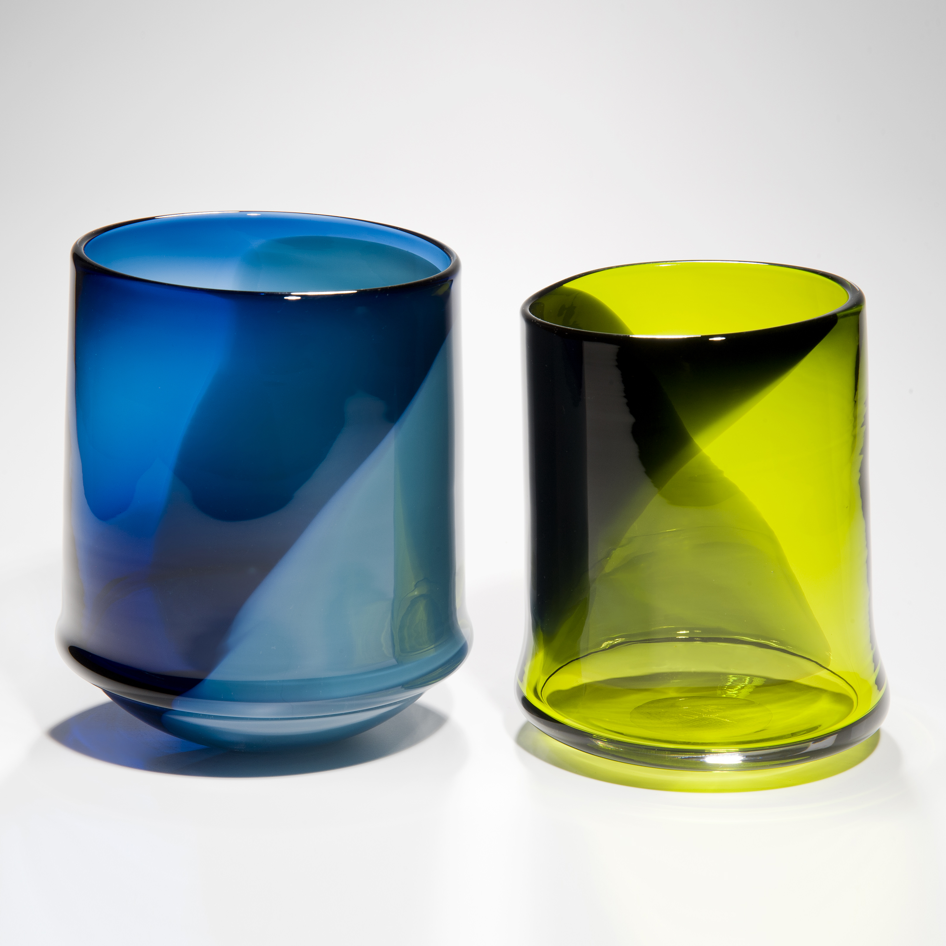 assortment of glass art pots in bright colours