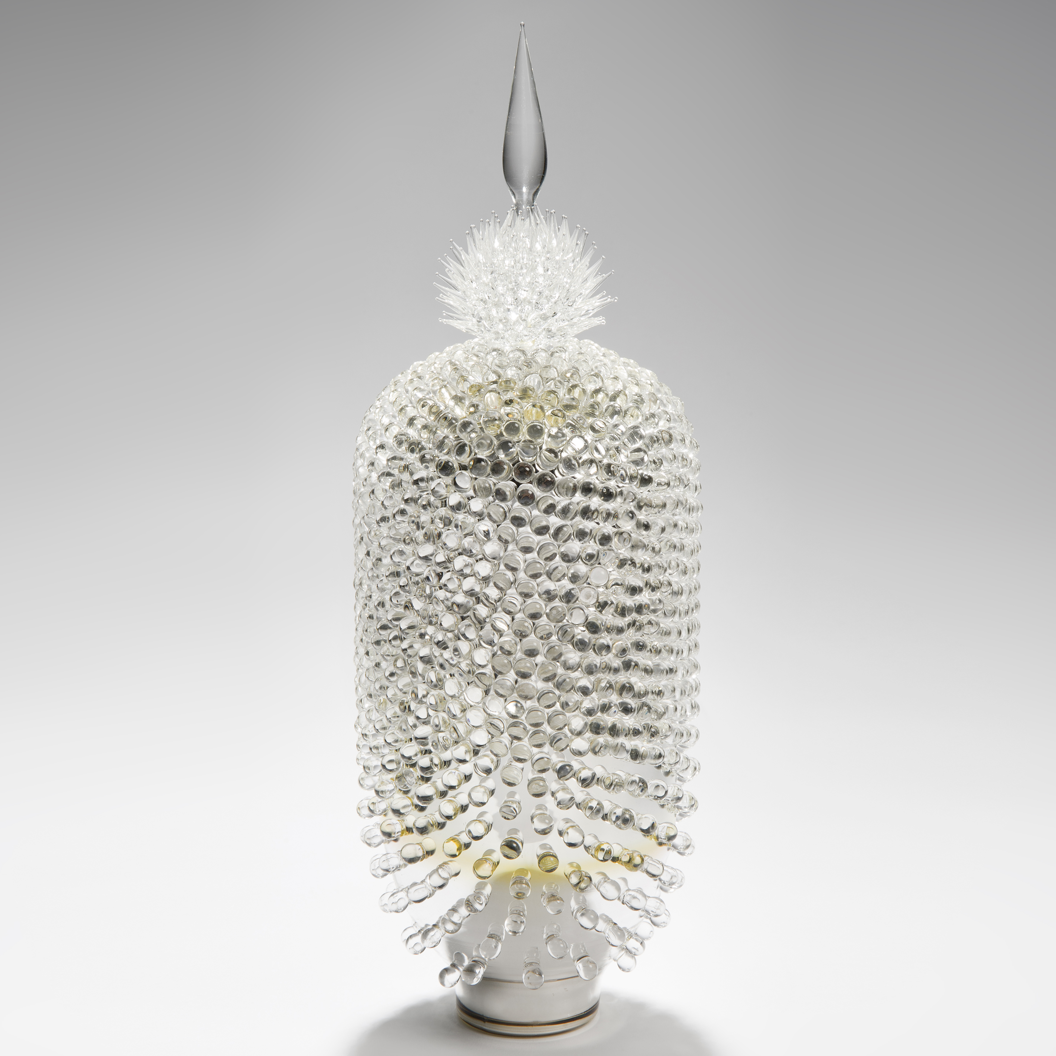 tall crystal coloured art-glass sculpture centrepiece of abstract botanical shape