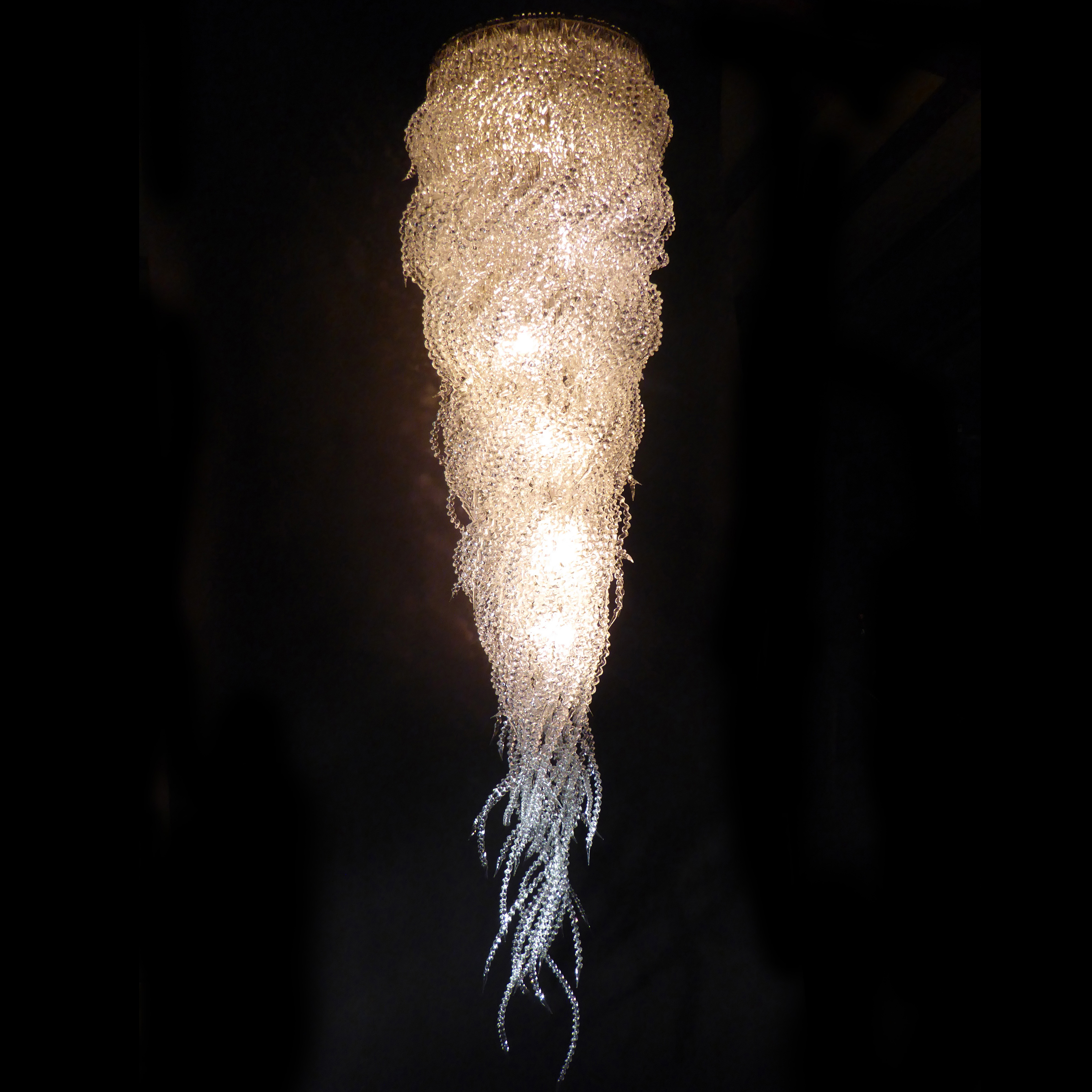 art glass lighting installation resembling jellyfish