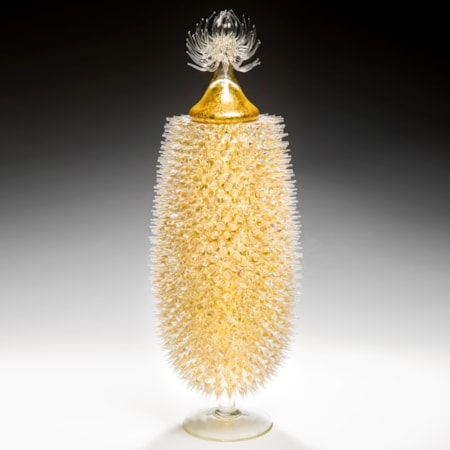 tall art-glass jar in yellow and gold with thistle shaped centre