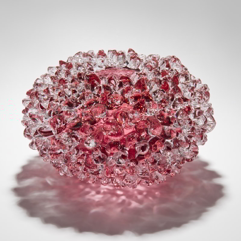 handblown glass ornamental art sculpture in pink of crystal flower form