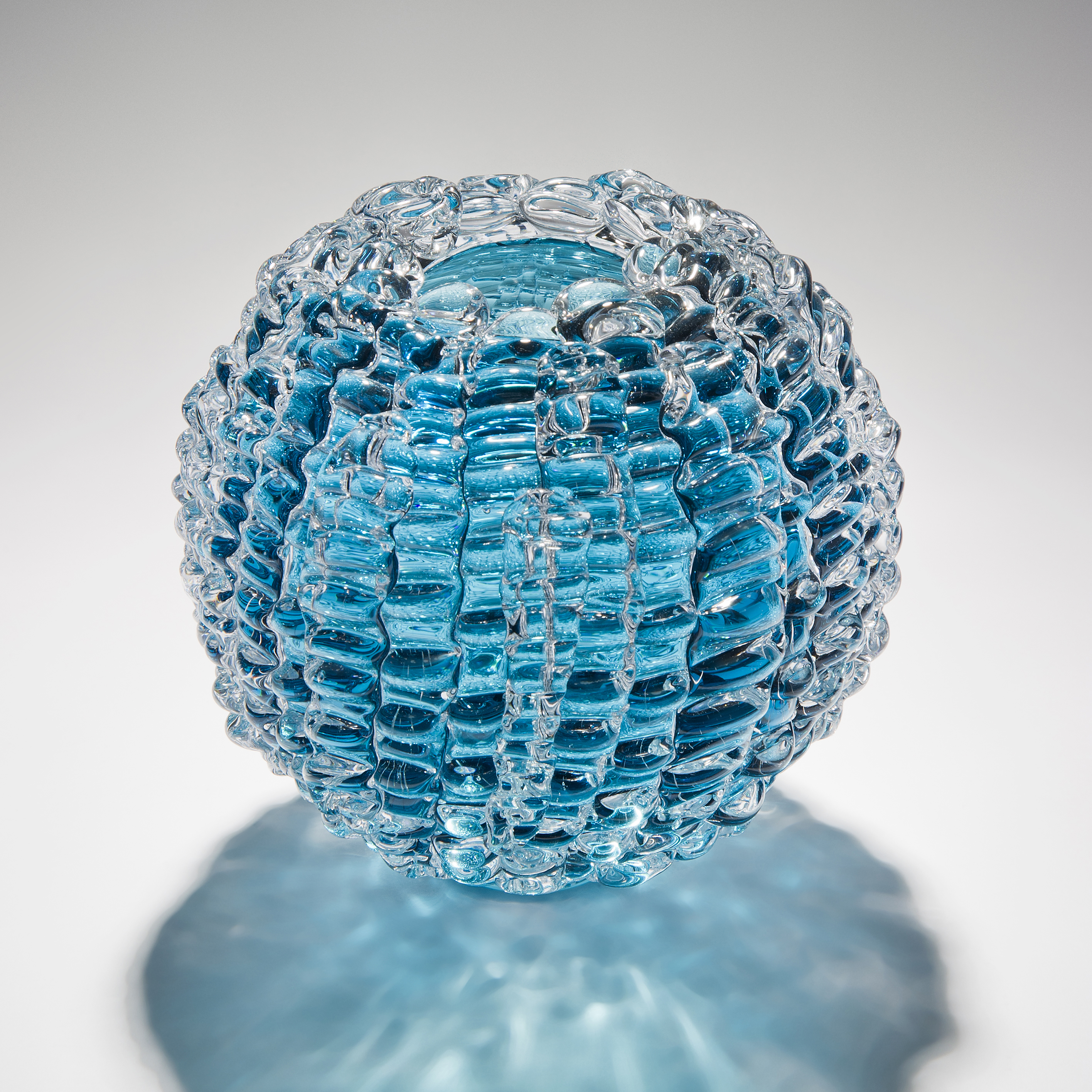 aqua blue handblown and sculpted spherical glass centrepiece made from small rectangular shards
