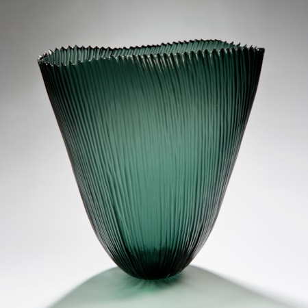 tall open sculpted green vessel with ribbed pattern