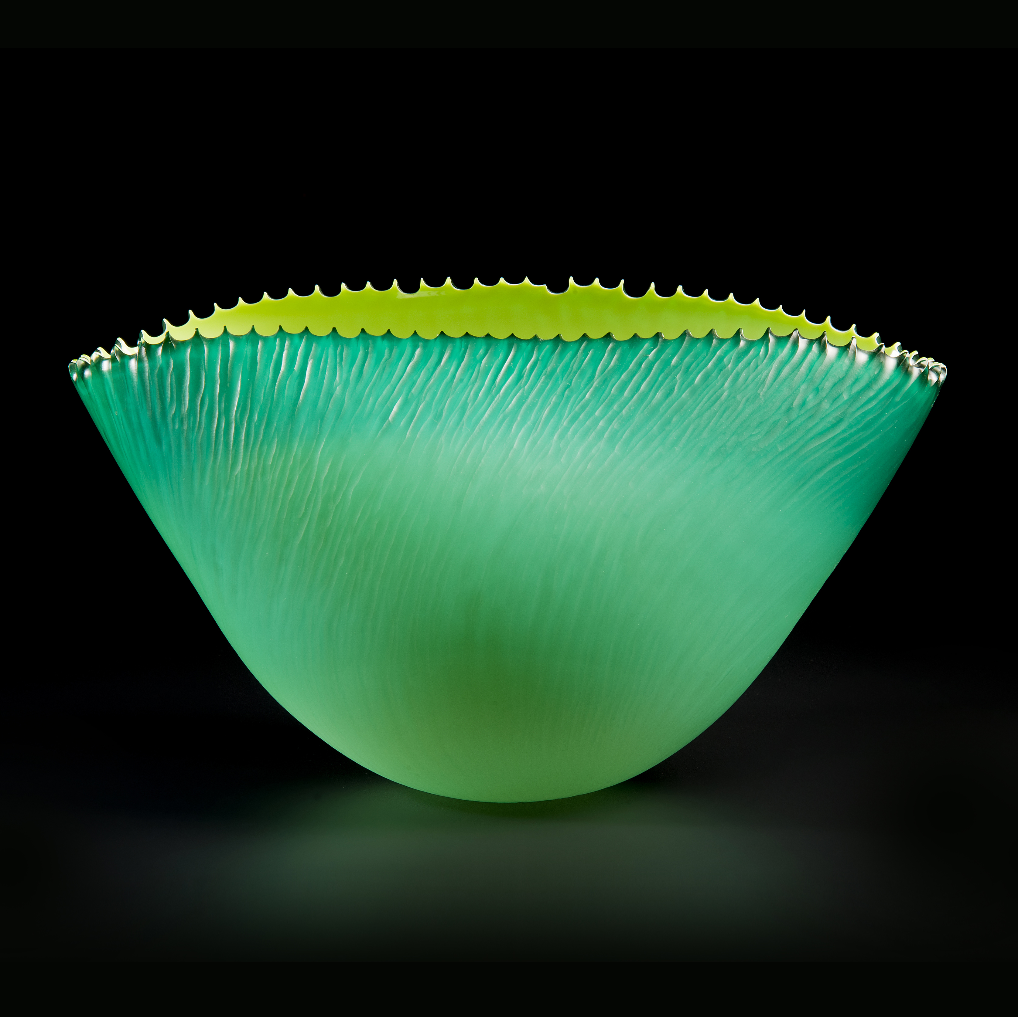lime green glass bowl sculpture with jagged edge