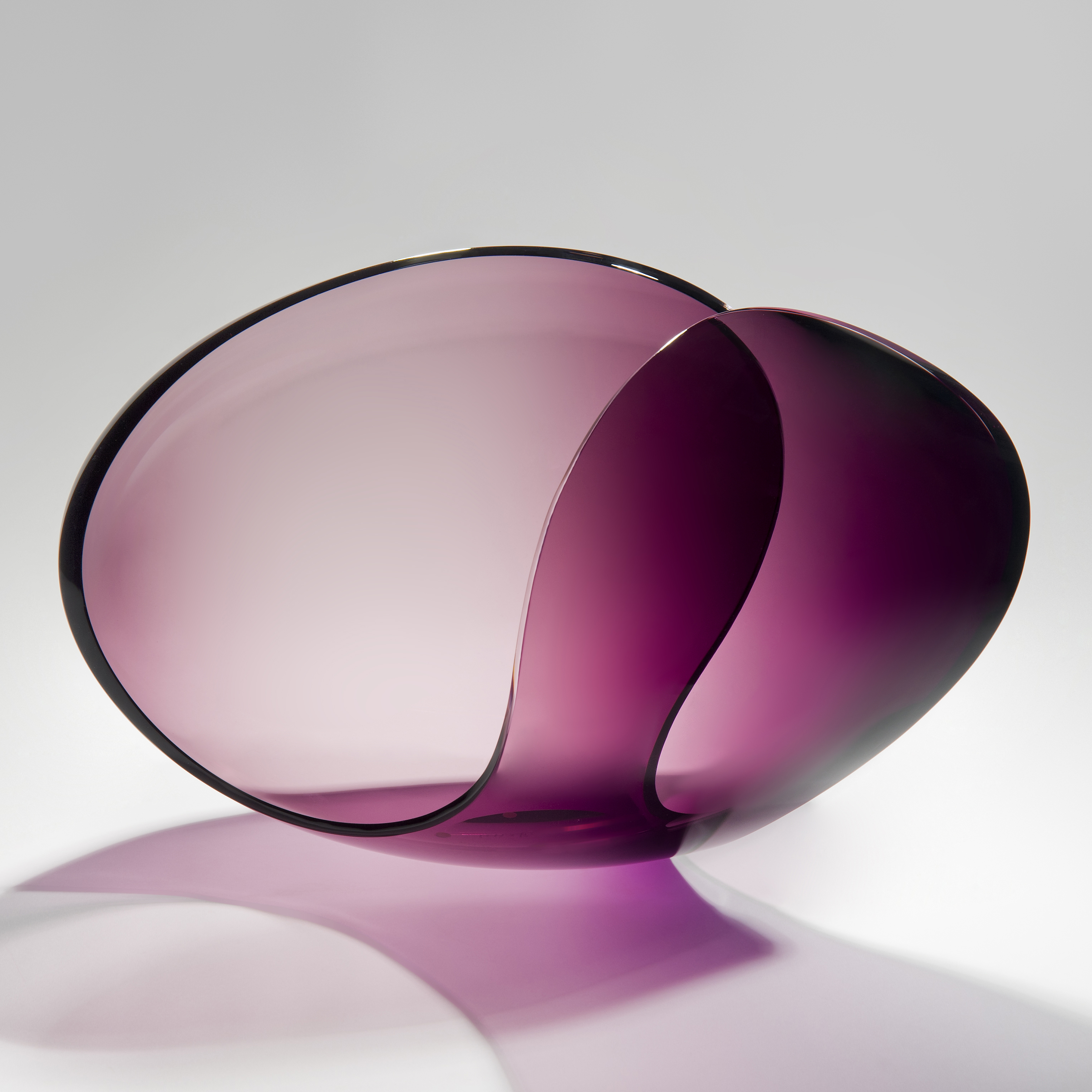 violet modern minimalist glass sculpture in concave shape