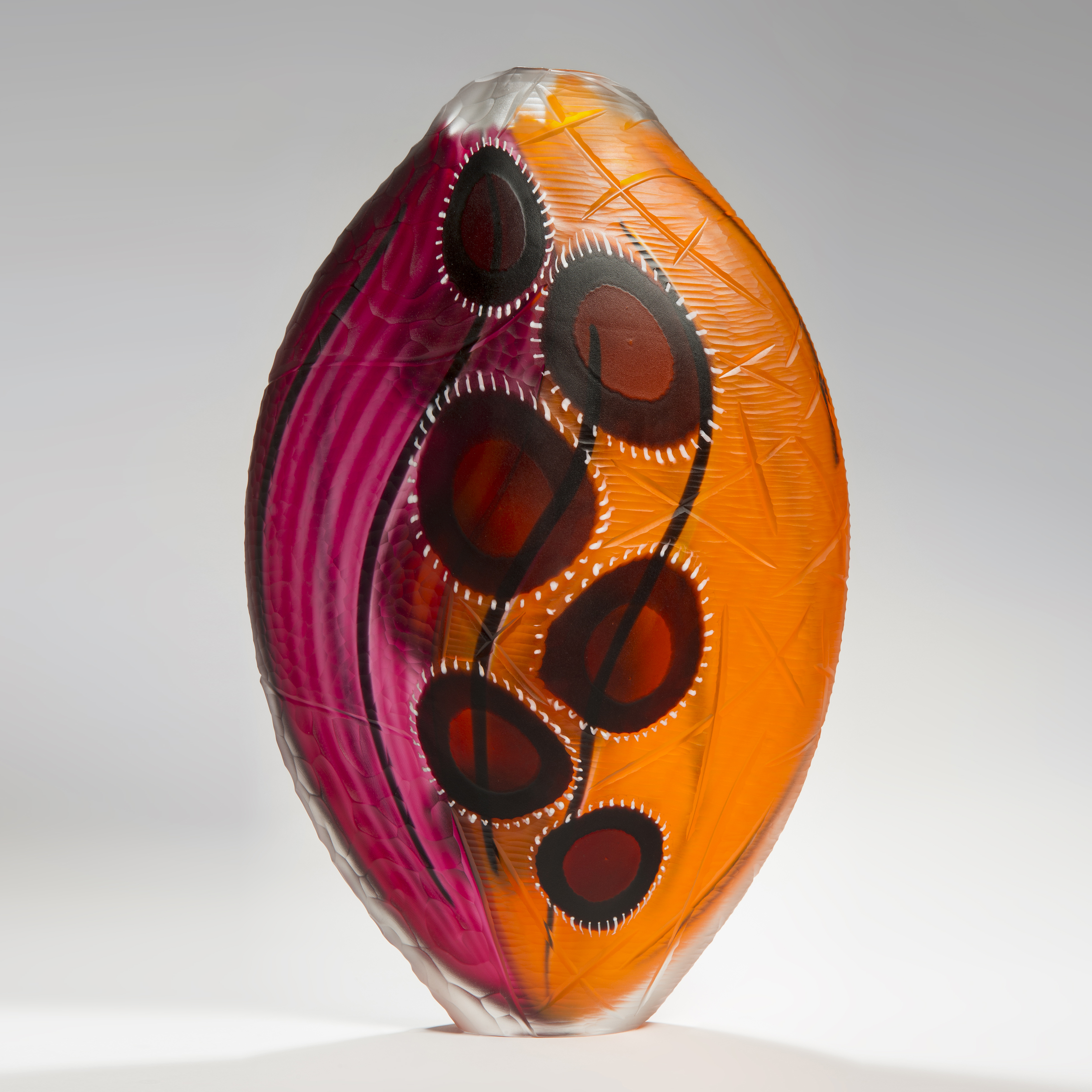 glass vase sculpture in orange and pink with blood red blobs