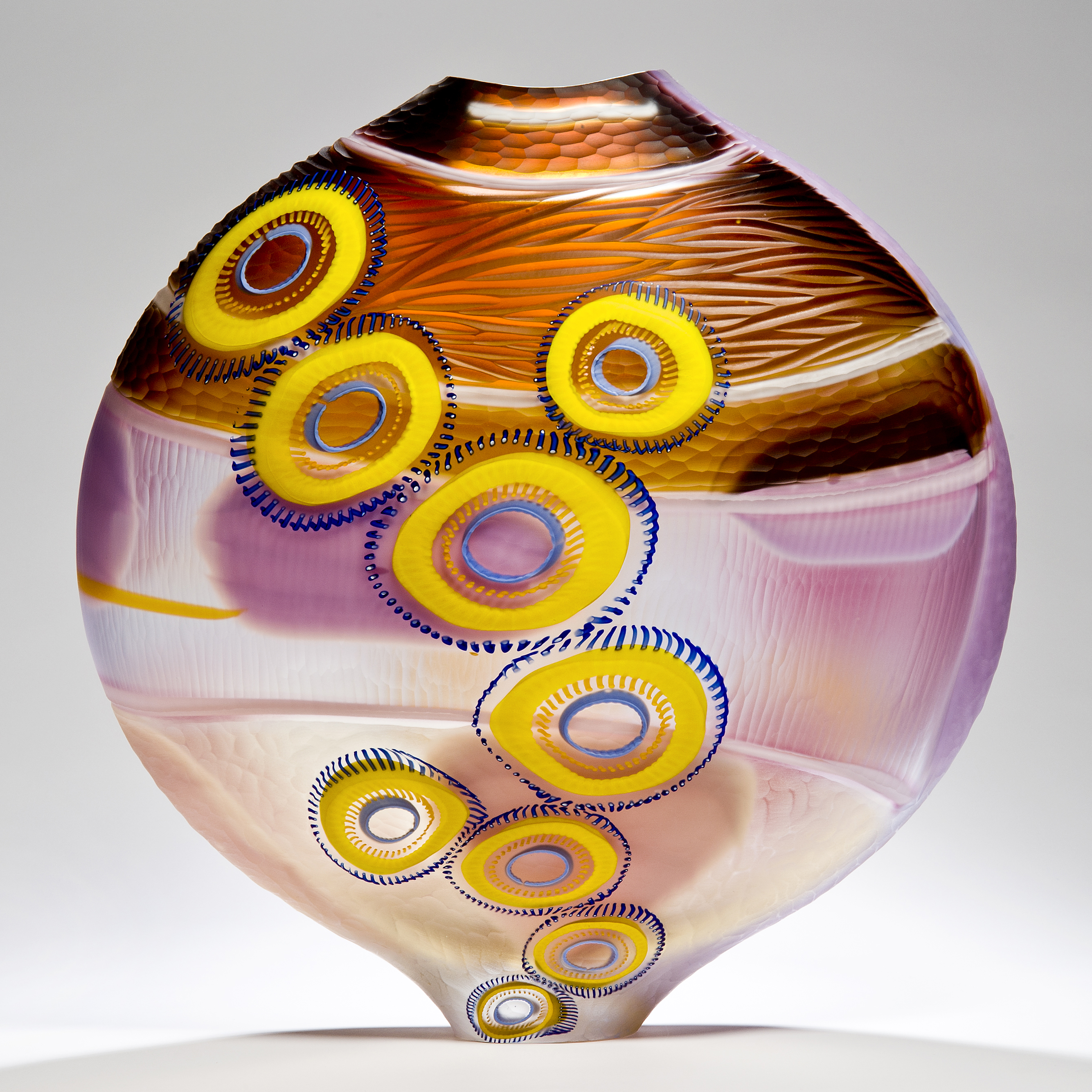 short colourful art glass vase sculpture with elliptical shapes