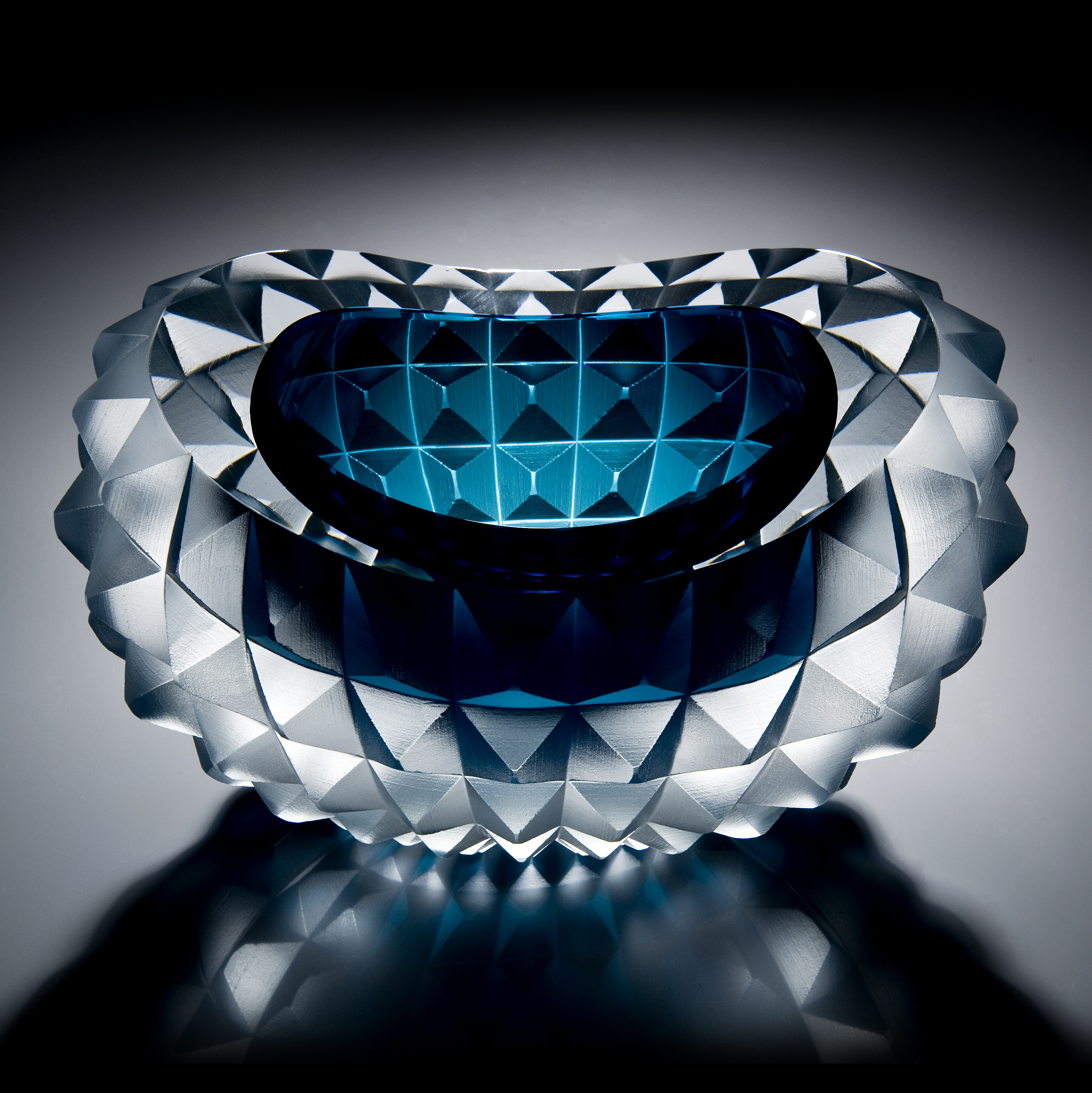 art glass bowl with pyramid stud shaped exterior in aqua and white