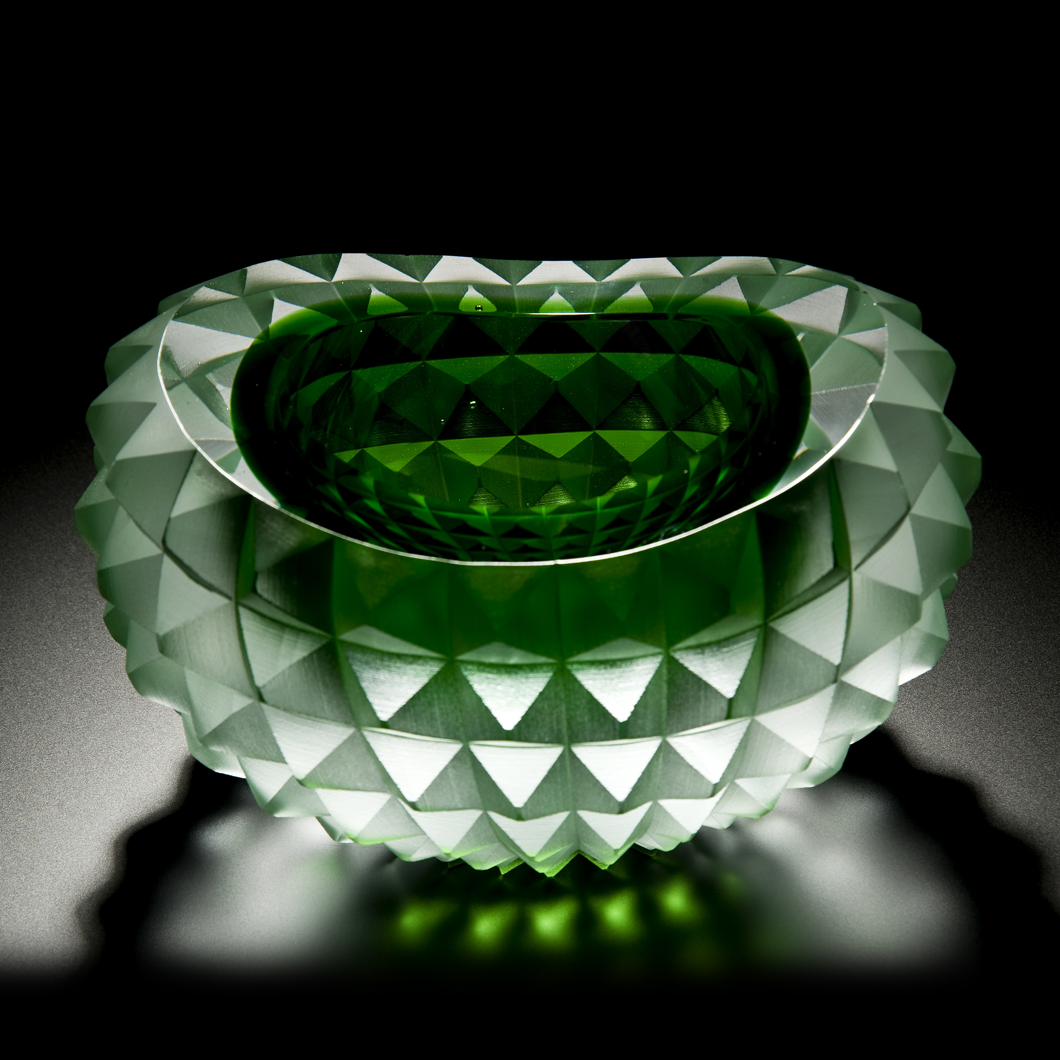 art glass bowl with pyramid stud shaped exterior in green and white