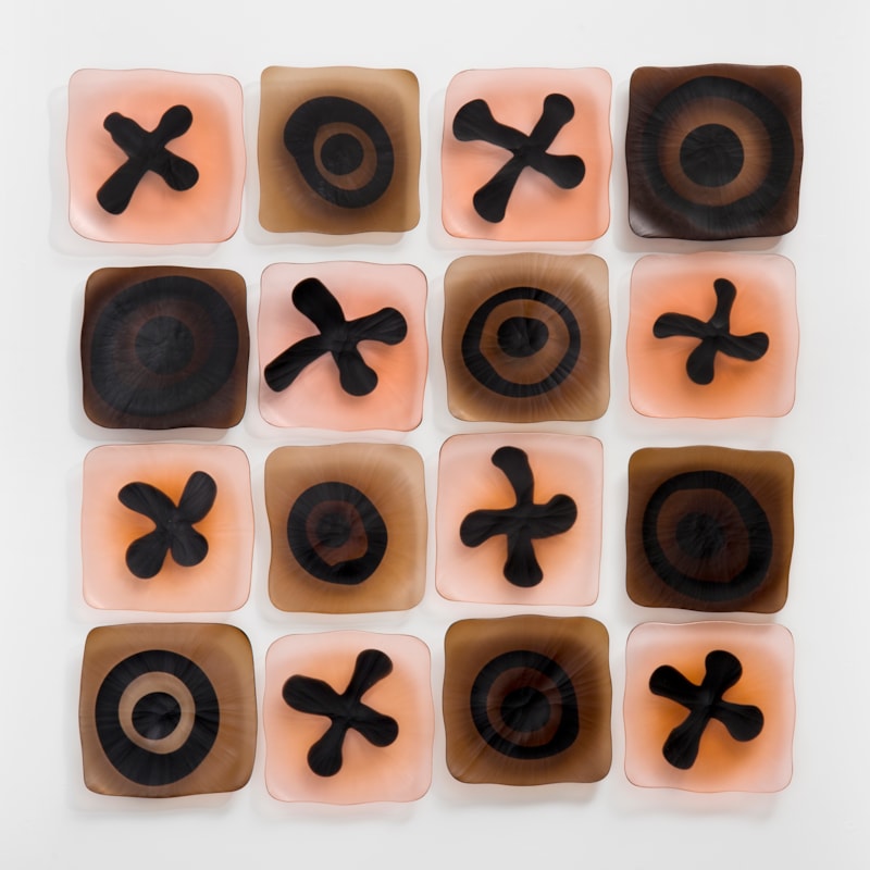 wall-mounted glass art sculpture resembling chocolate box in white brown and rose pink