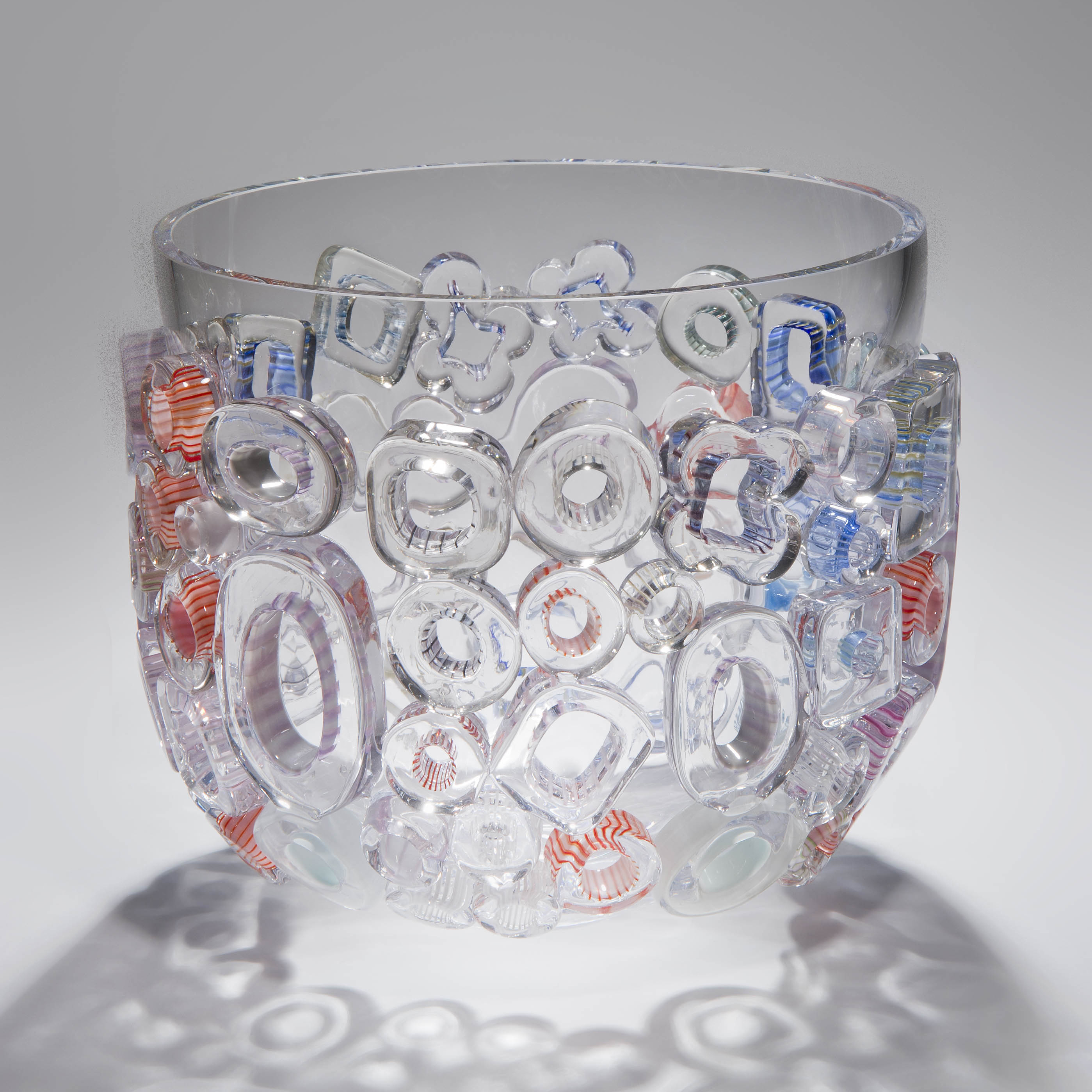 clear blown glass vase sculpture with external circle decorations