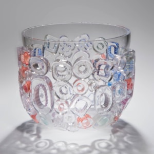 clear blown glass vase sculpture with external circle decorations
