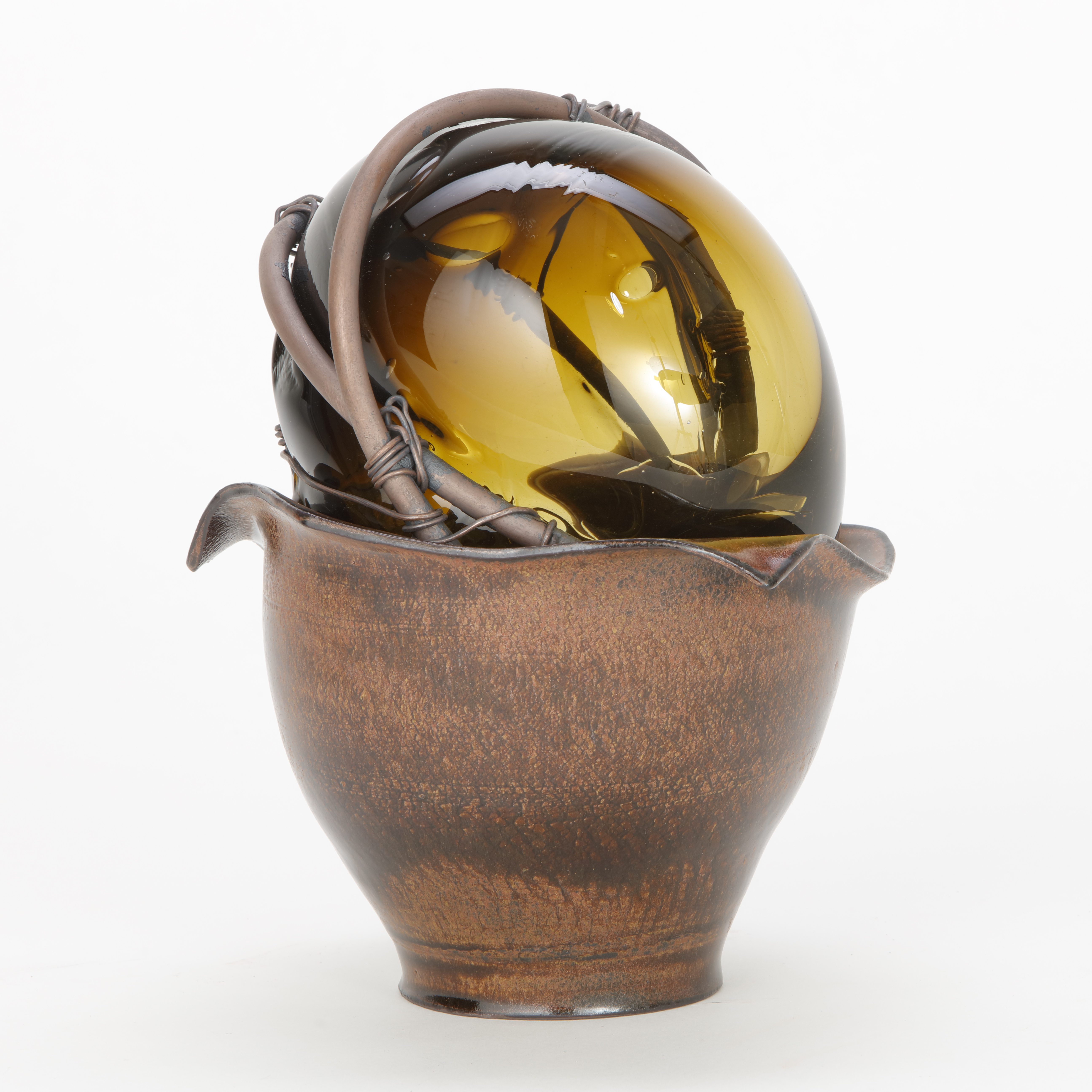 ornate modern handblown glass art sculpture in copper wire