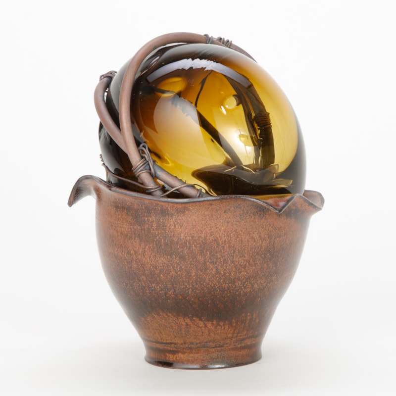 ornate modern handblown glass art sculpture in copper wire